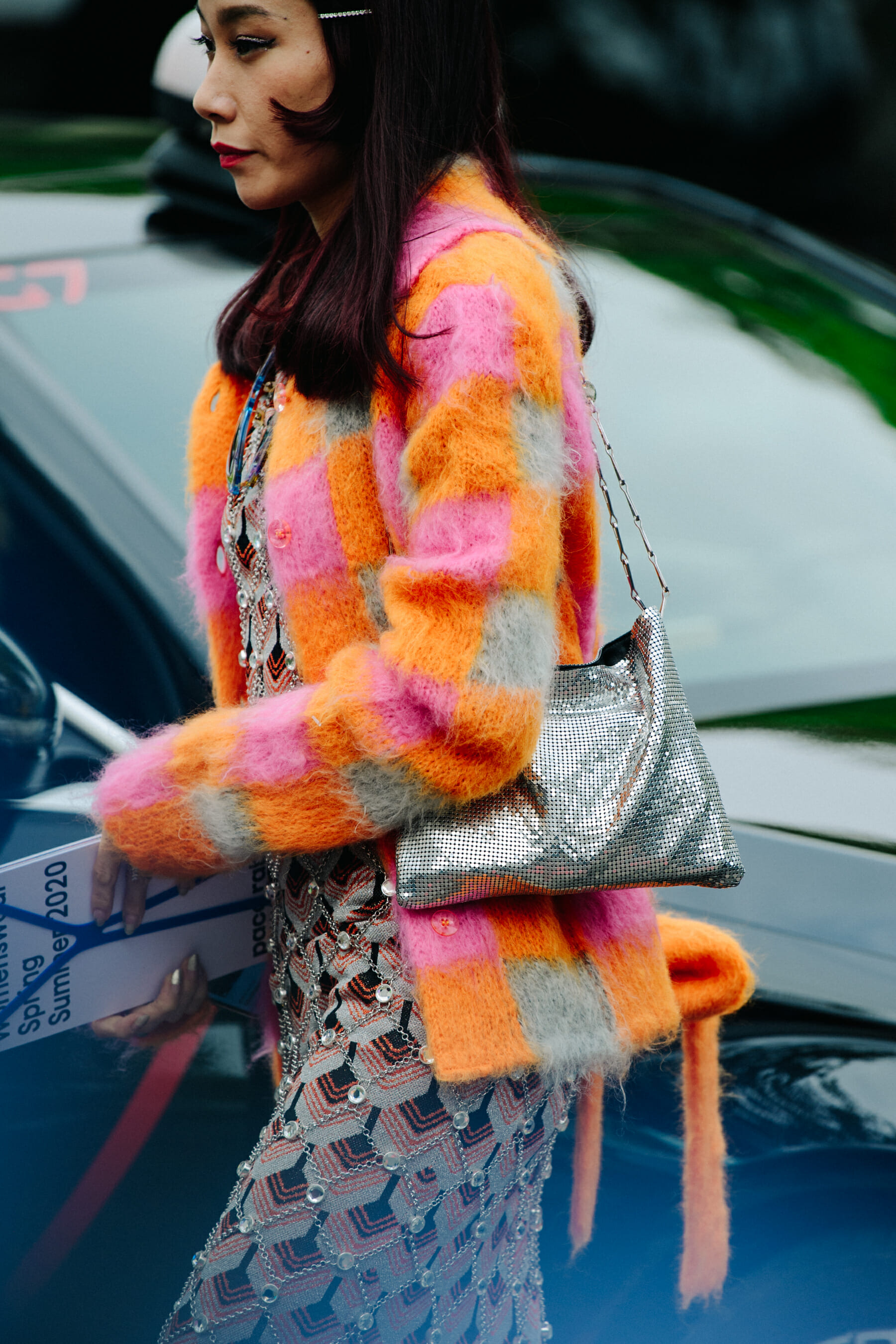 Woman wearing colourful cardigan