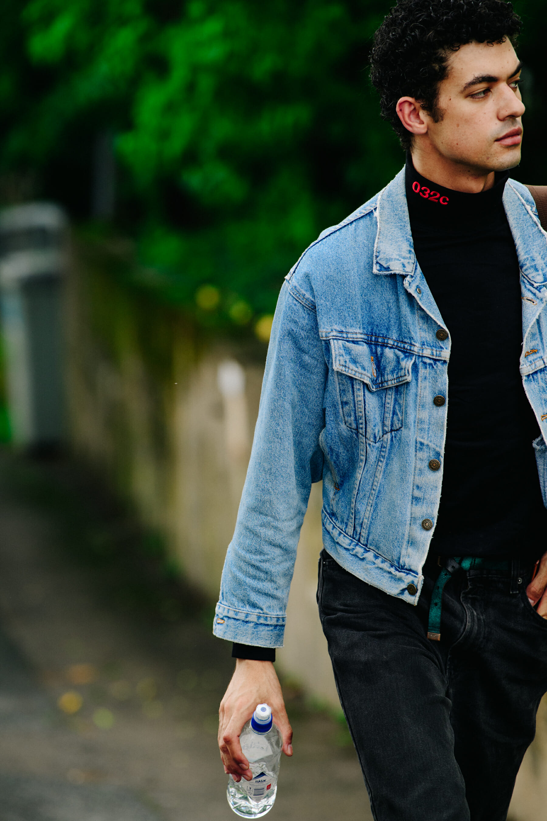 Man wearing 032c turtleneck