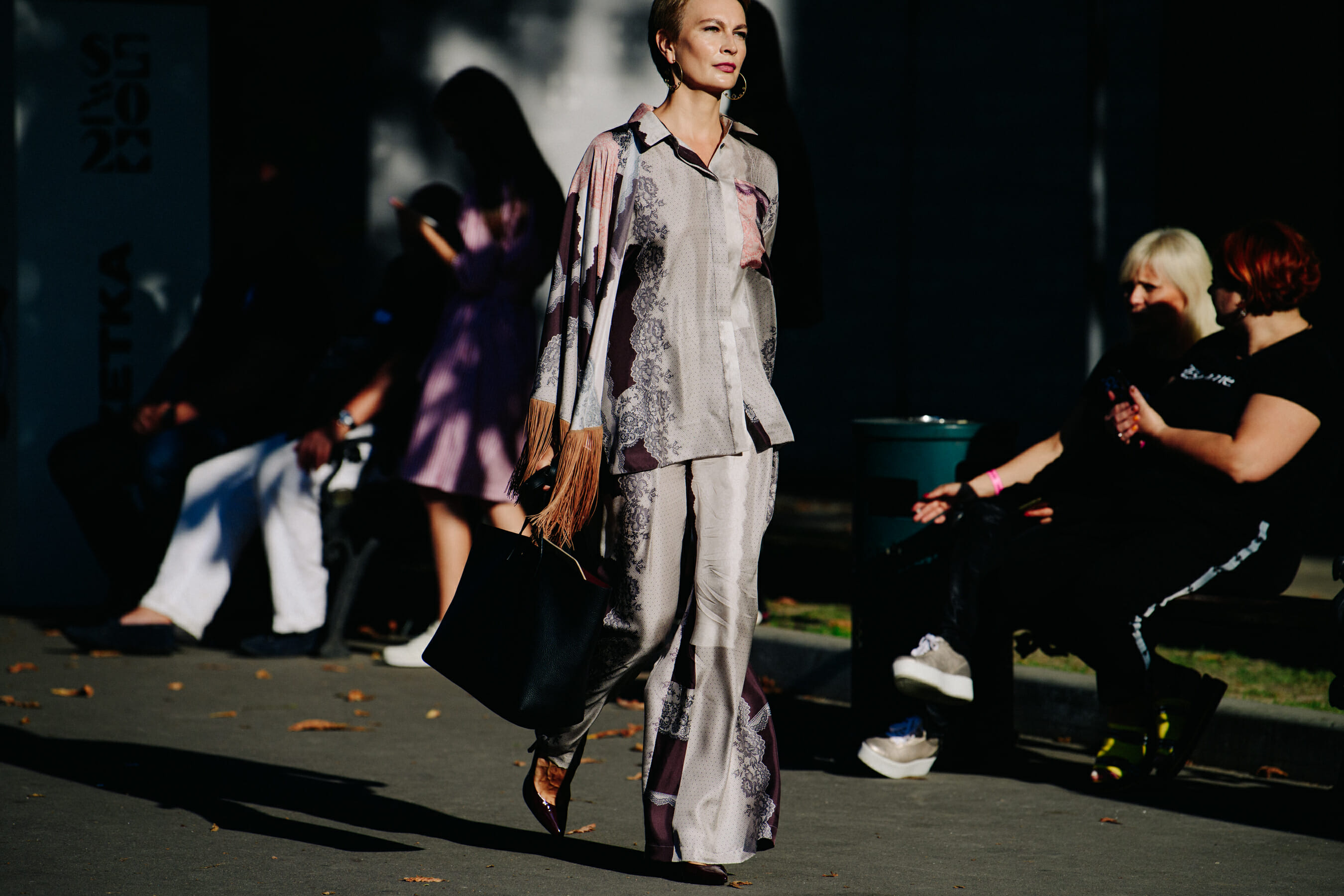 Woman wearing silver outfit
