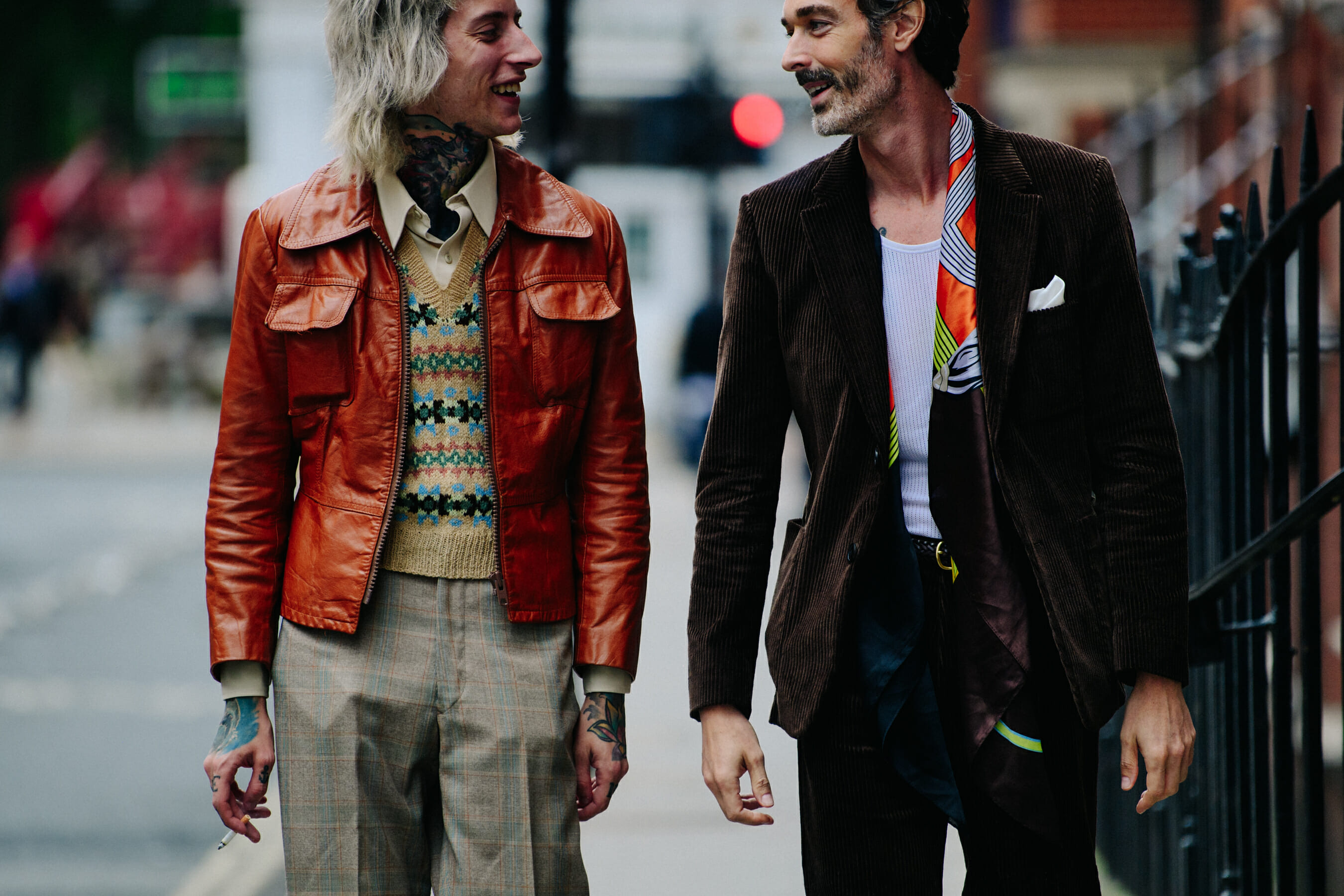 Two men wearing brown