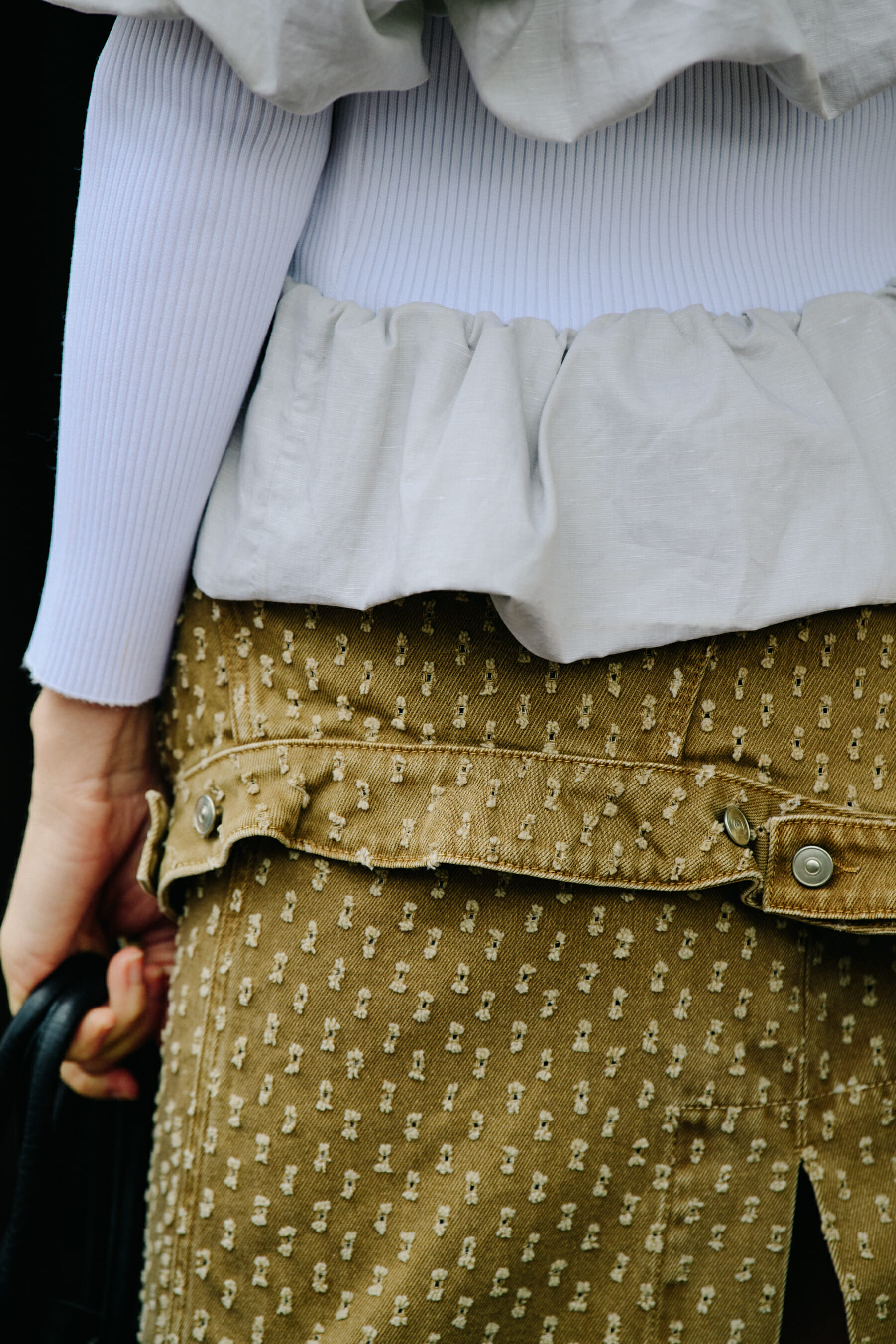 Woman wearing denim jacket skirt
