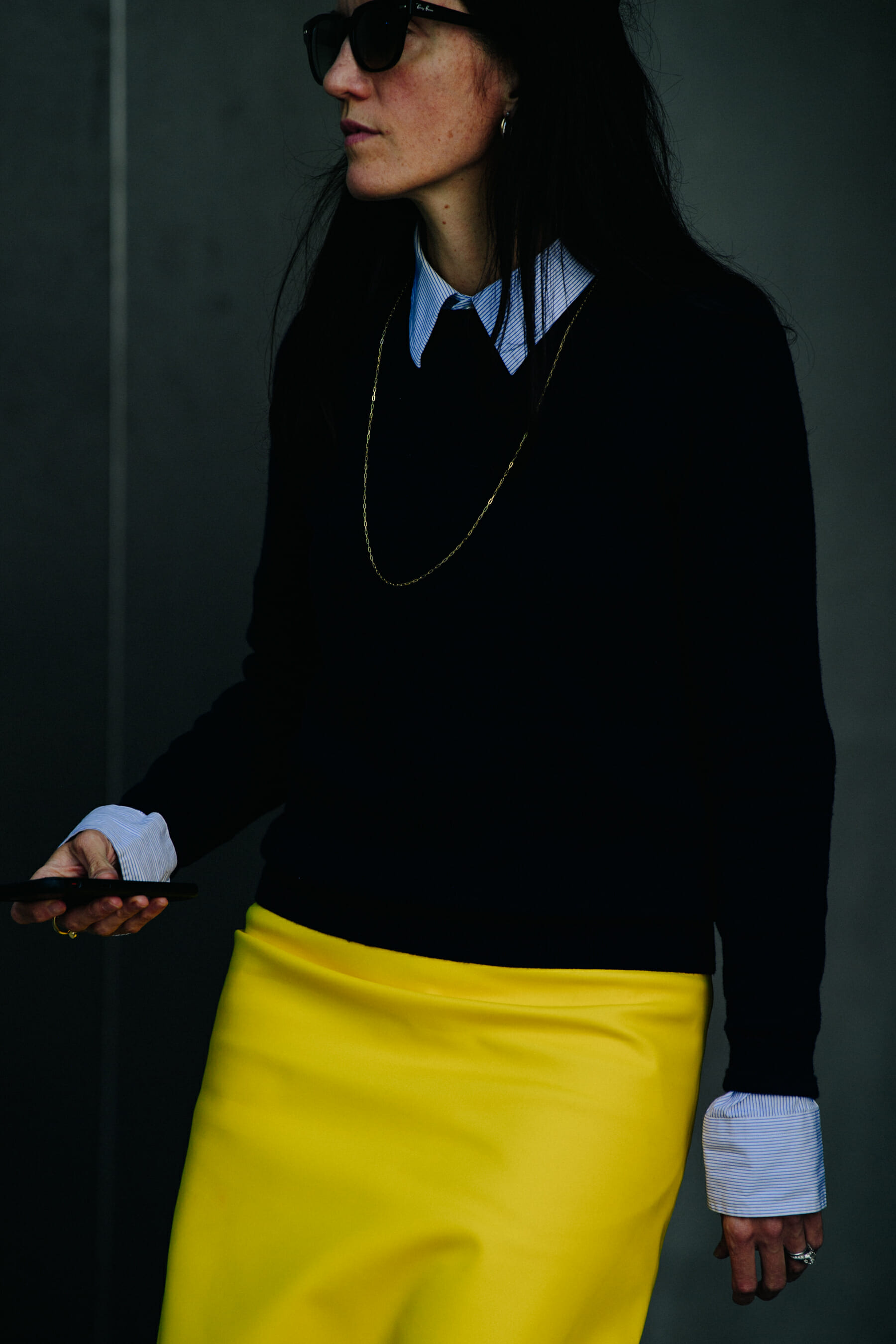 Woman wearing yellow skirt