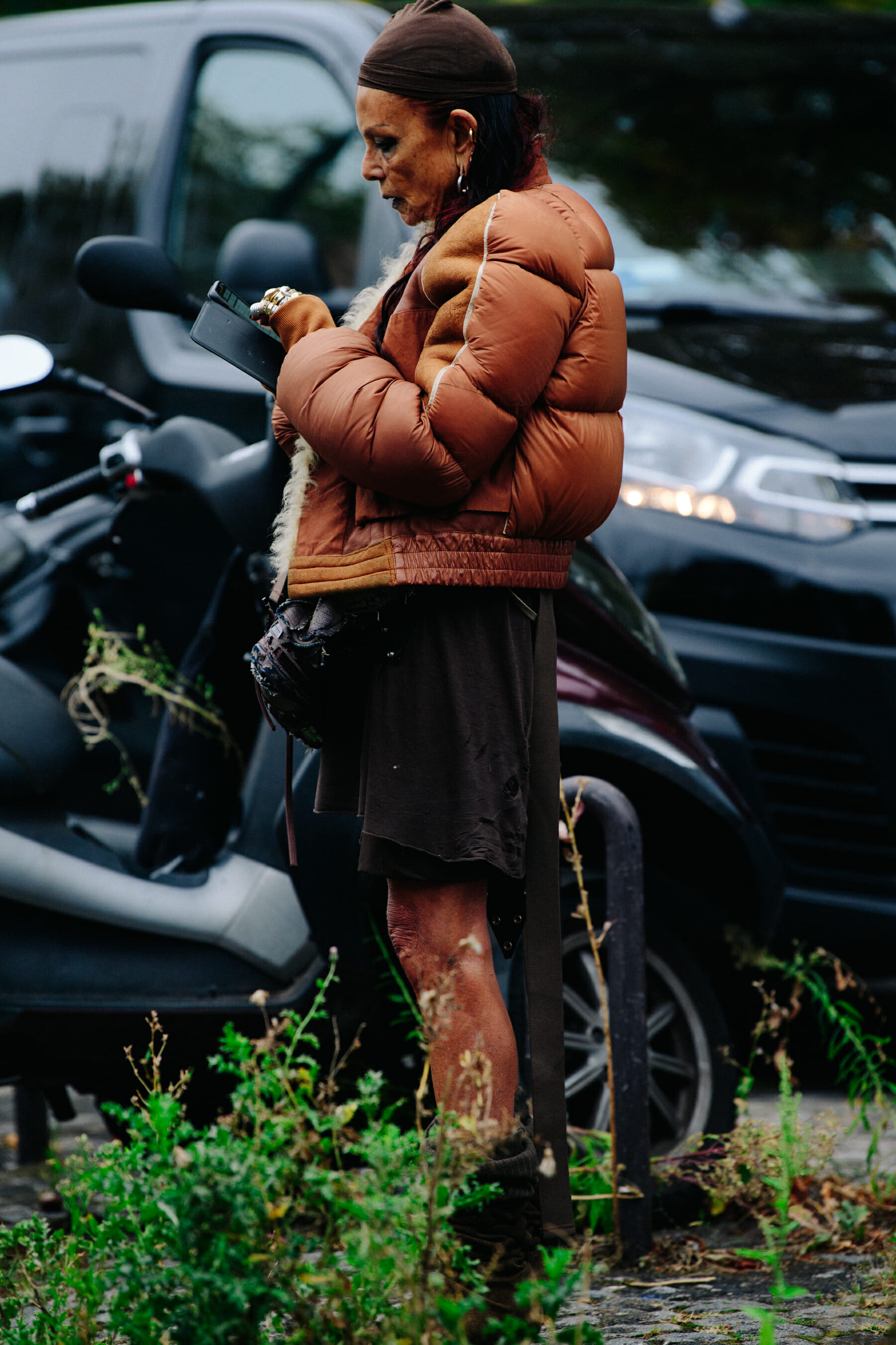Woman wearing brown jacket