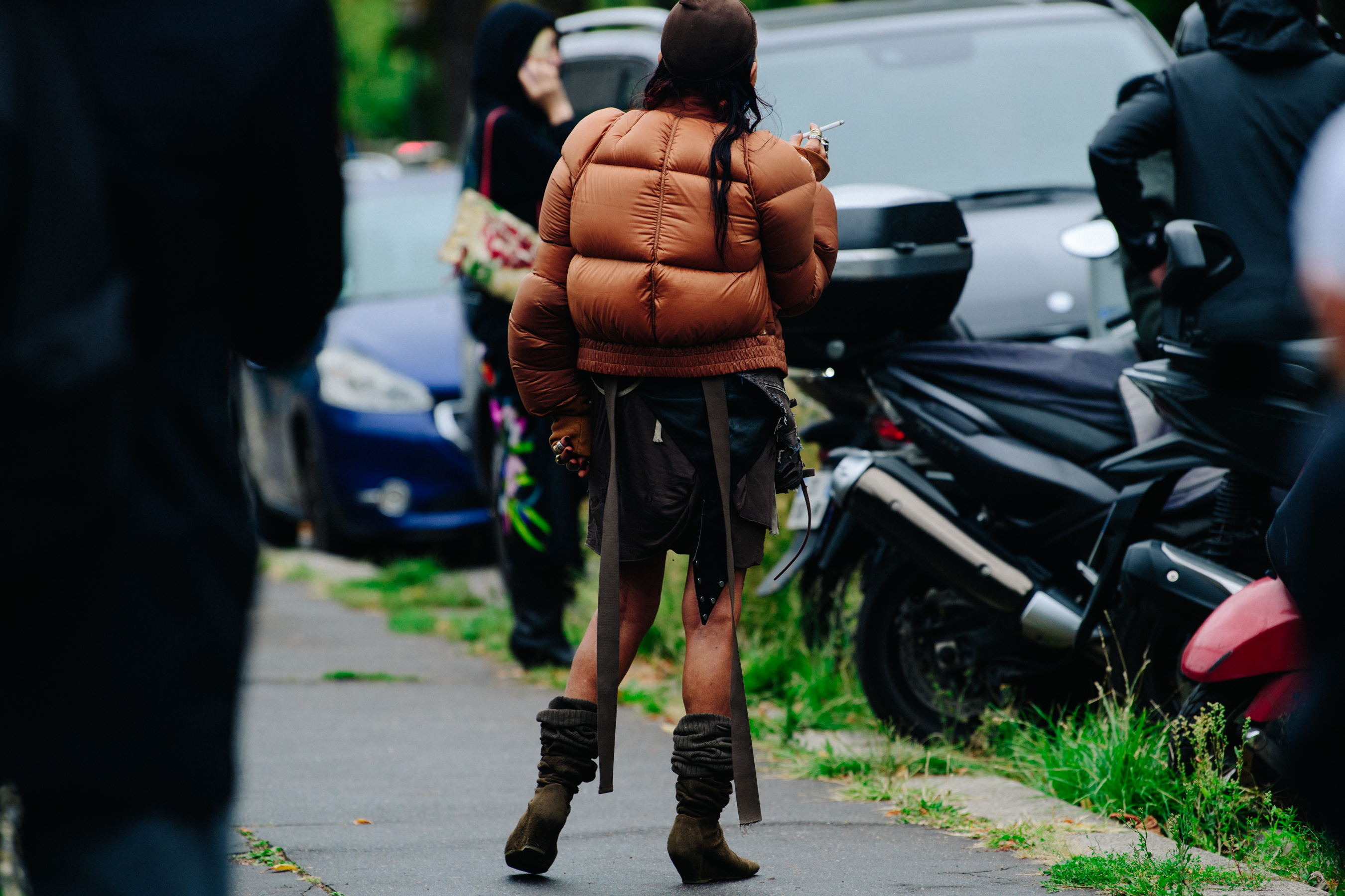 Woman wearing brown jacket