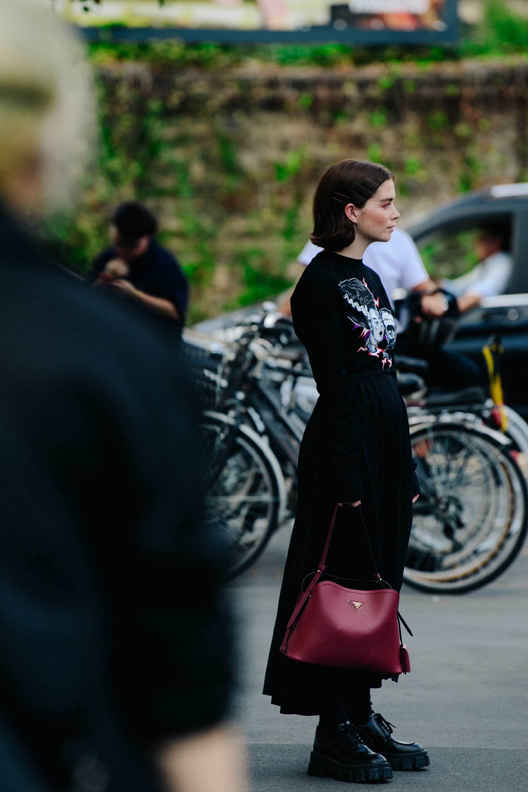 Woman carrying Prada bag