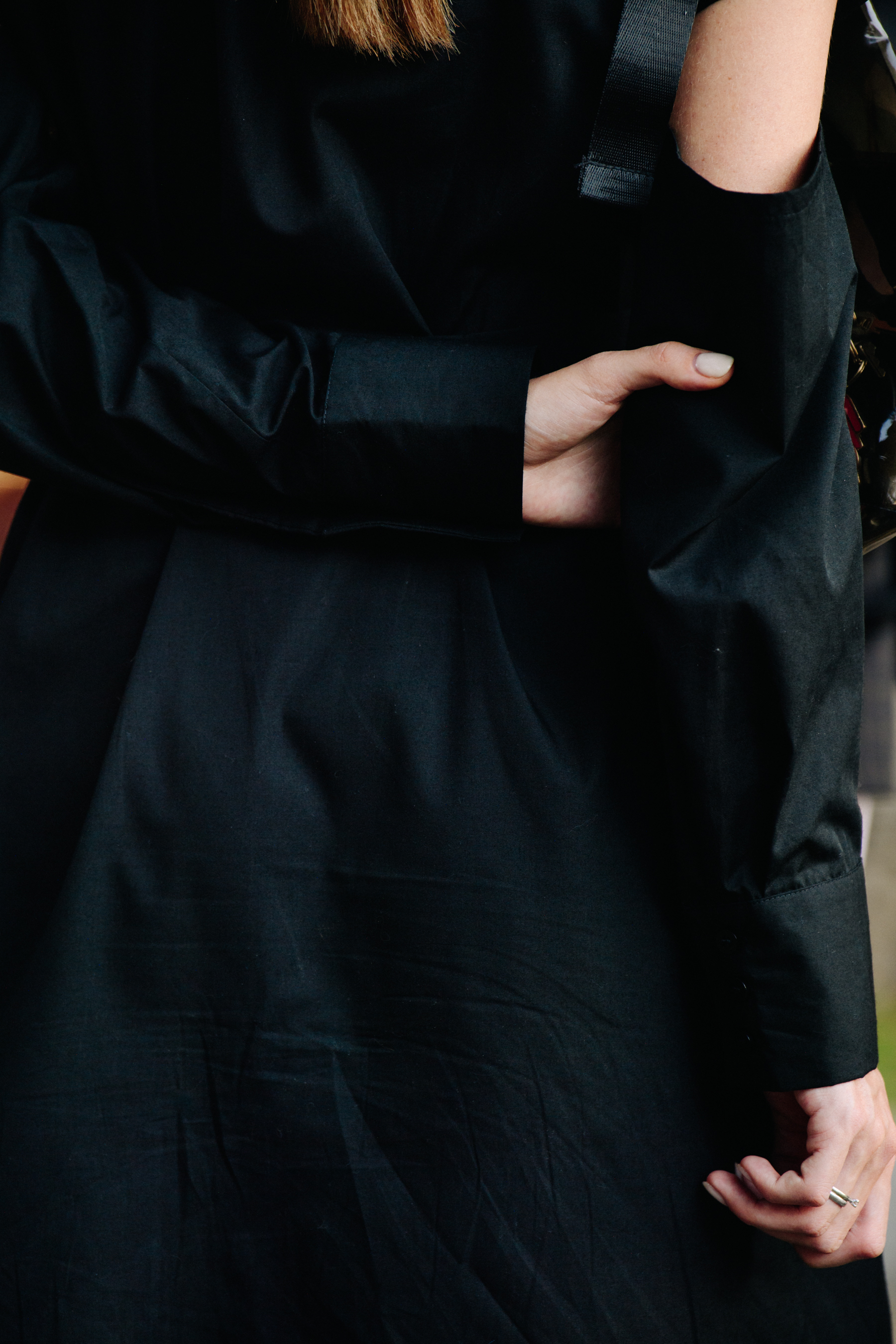 Woman wearing black suit