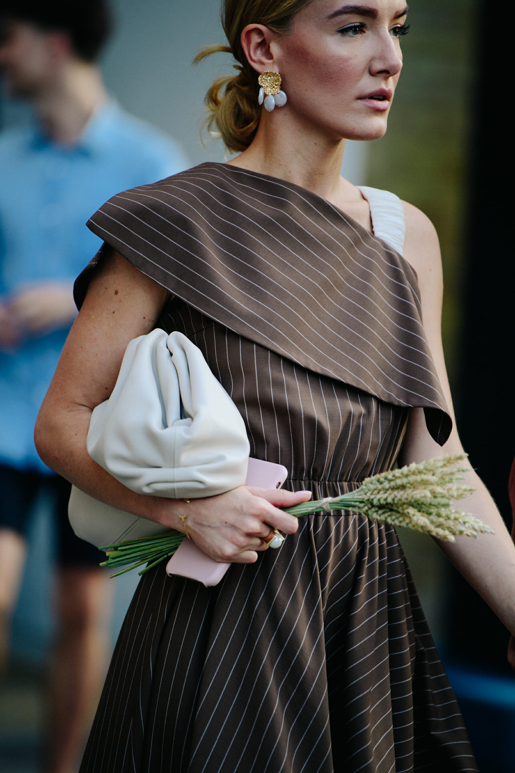 Woman wearing brown striped dress