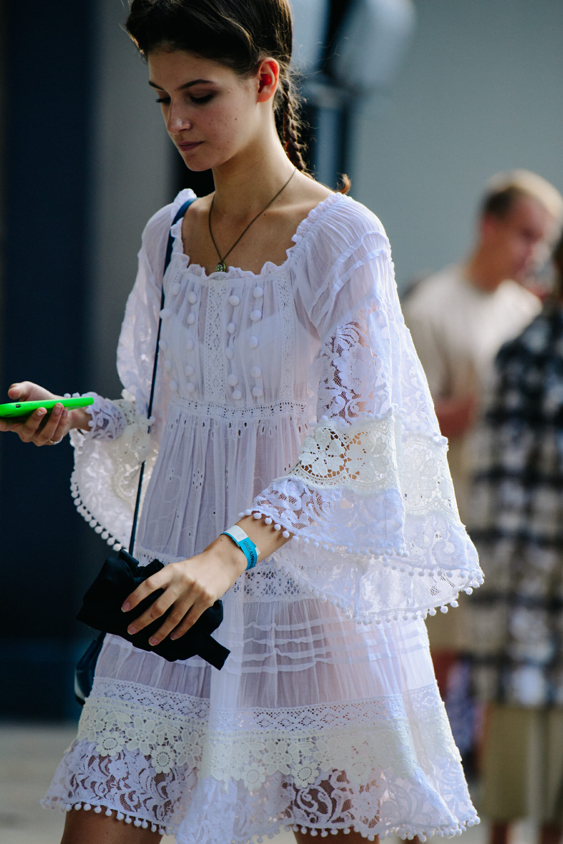Model wearing white dress