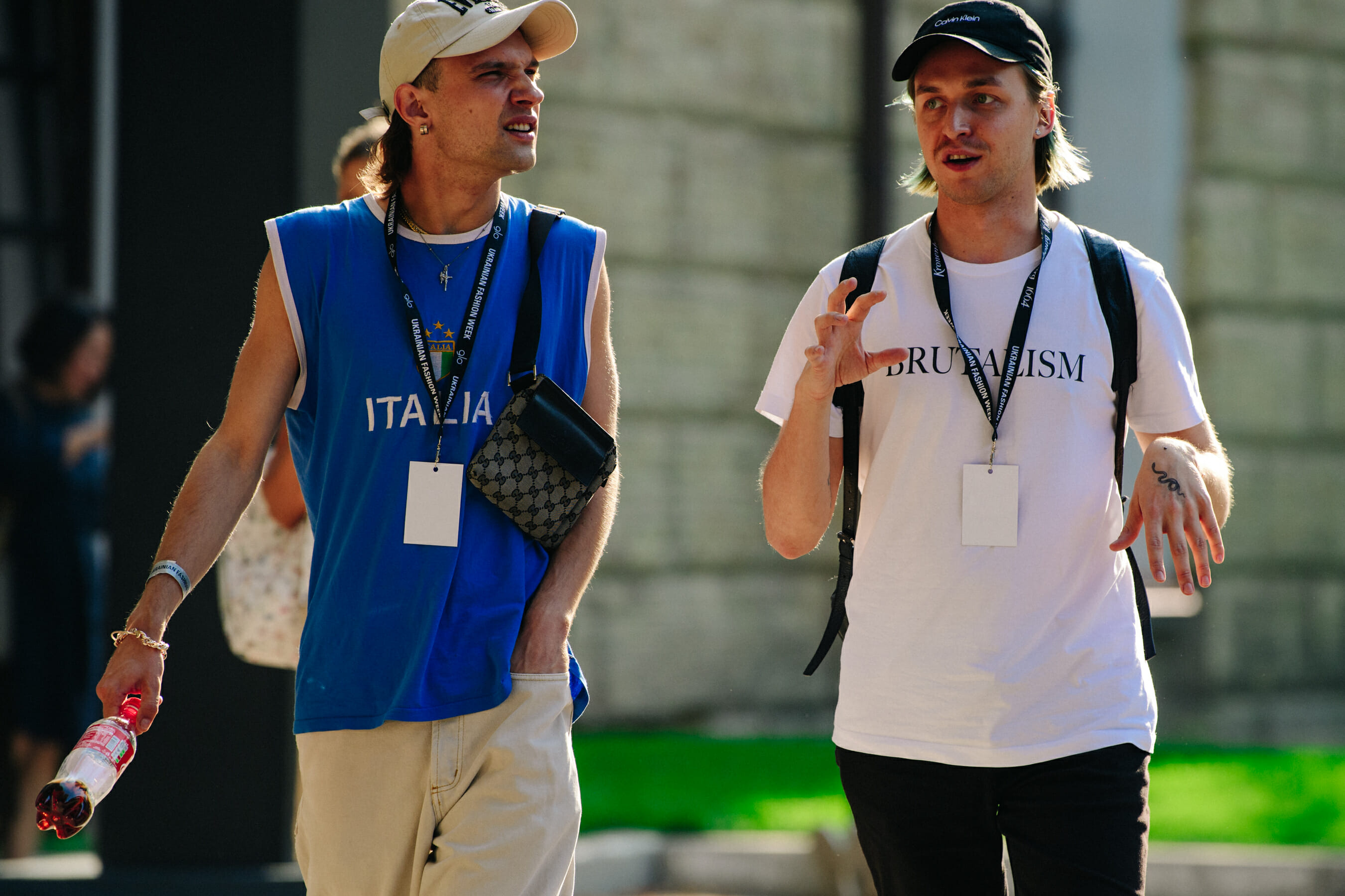 Two men wearing caps