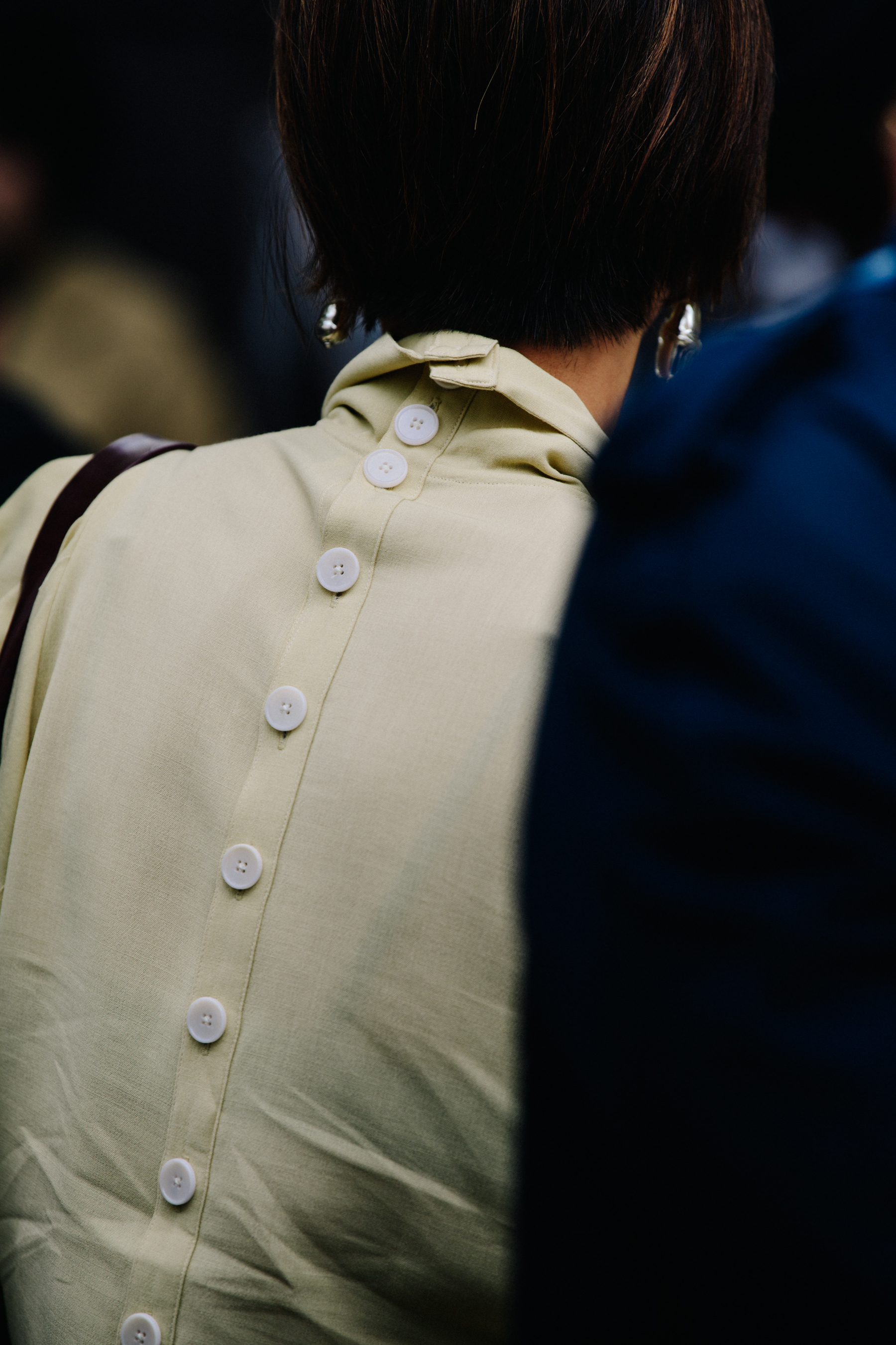 Woman wearing yellow top