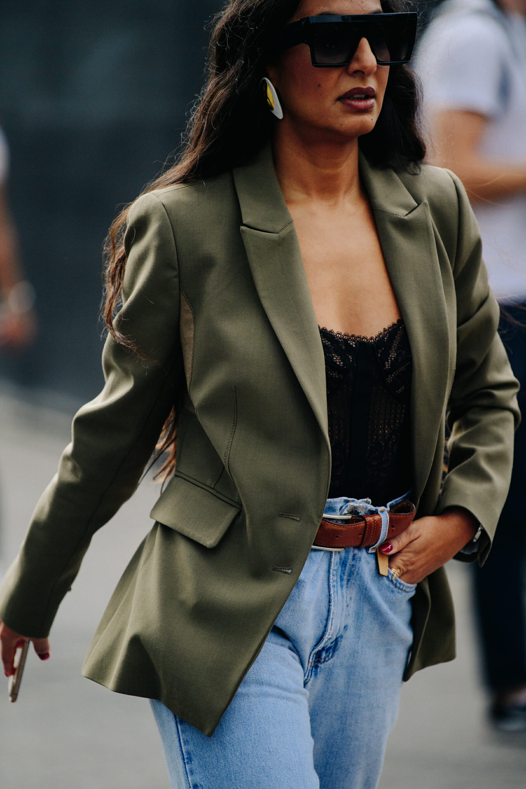 Woman wearing green blazer