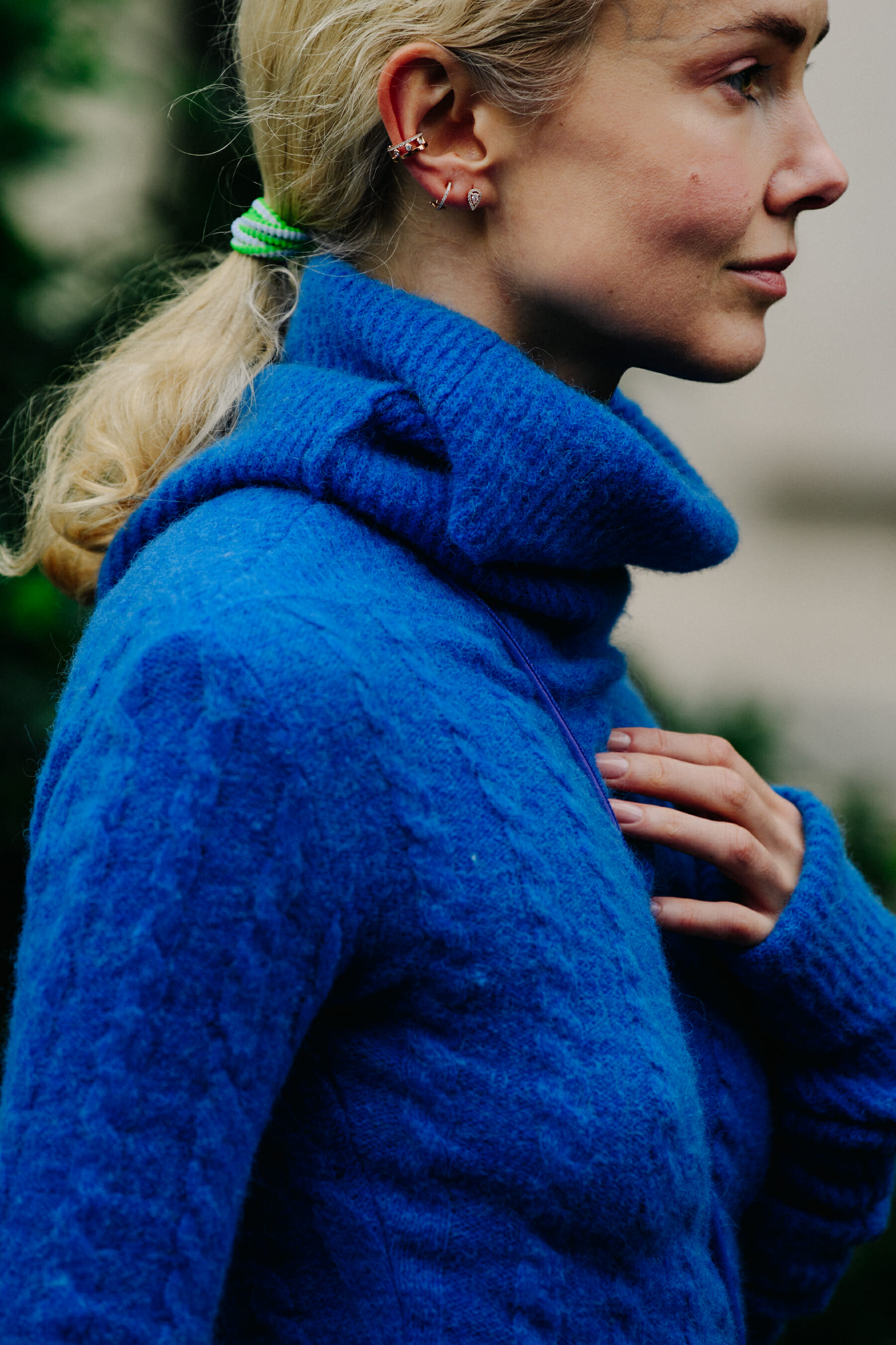 Woman wearing blue wool jumper