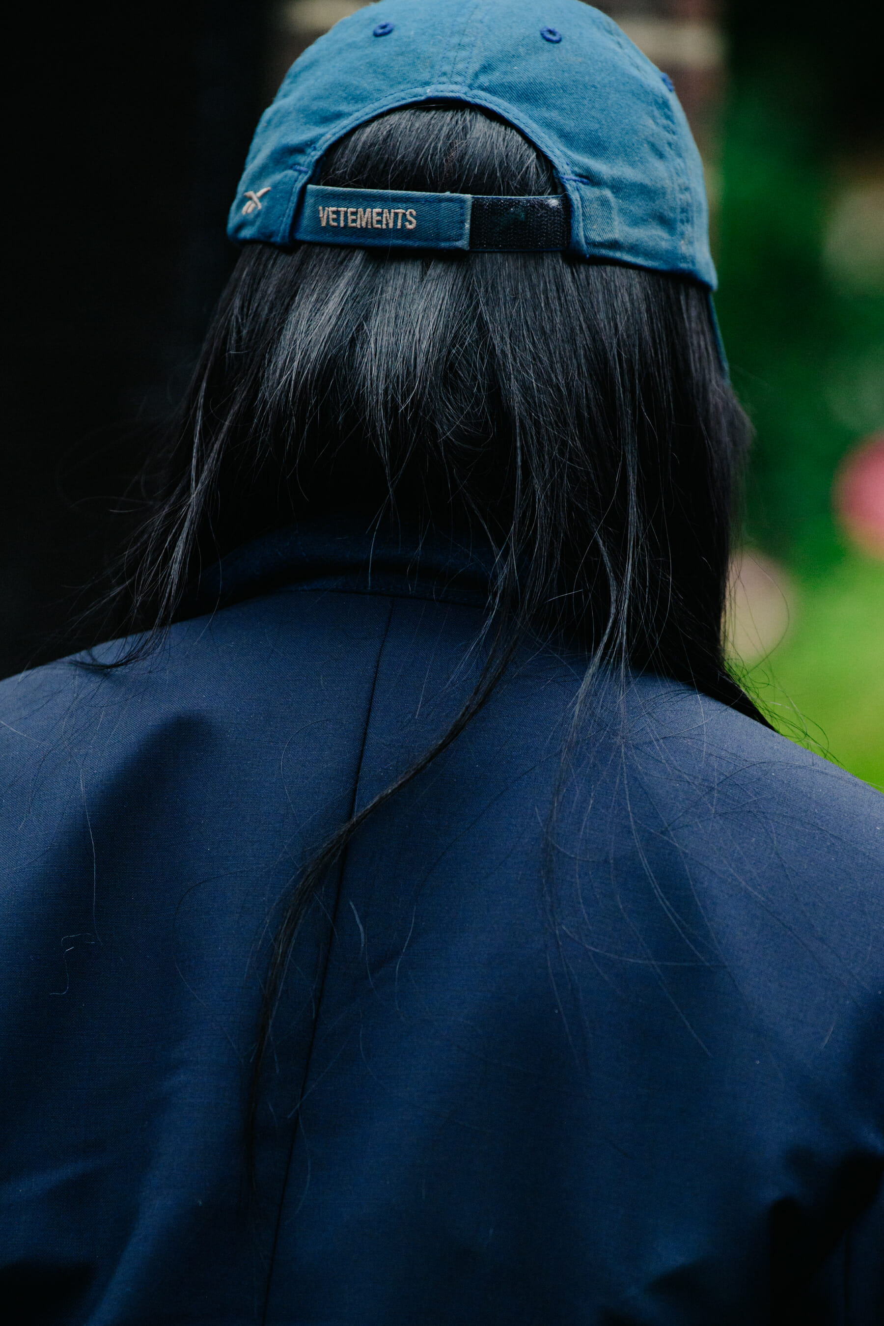 Woman wearing Vetements cap