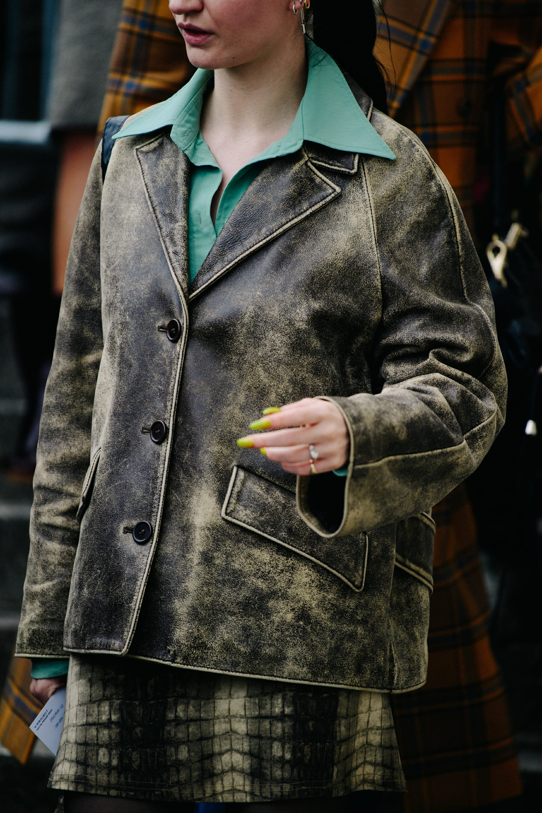 Woman wearing leather coat