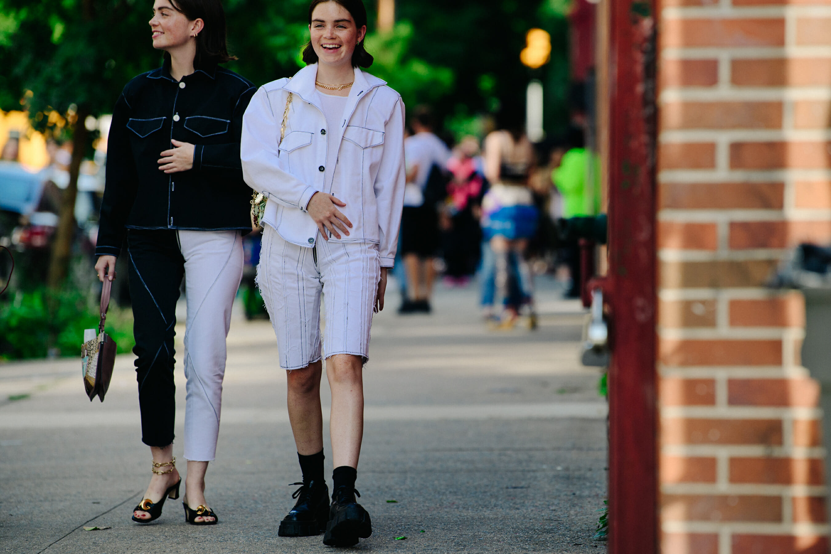 Two sisters wearing white and black