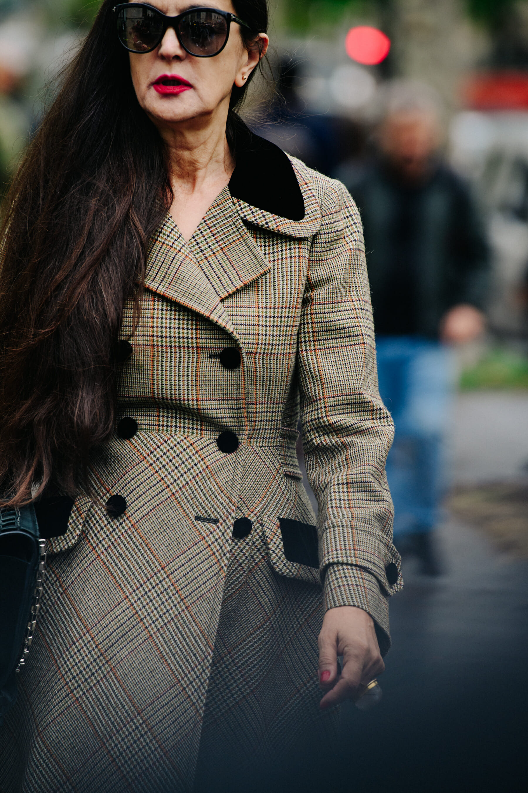 Woman wearing check coat