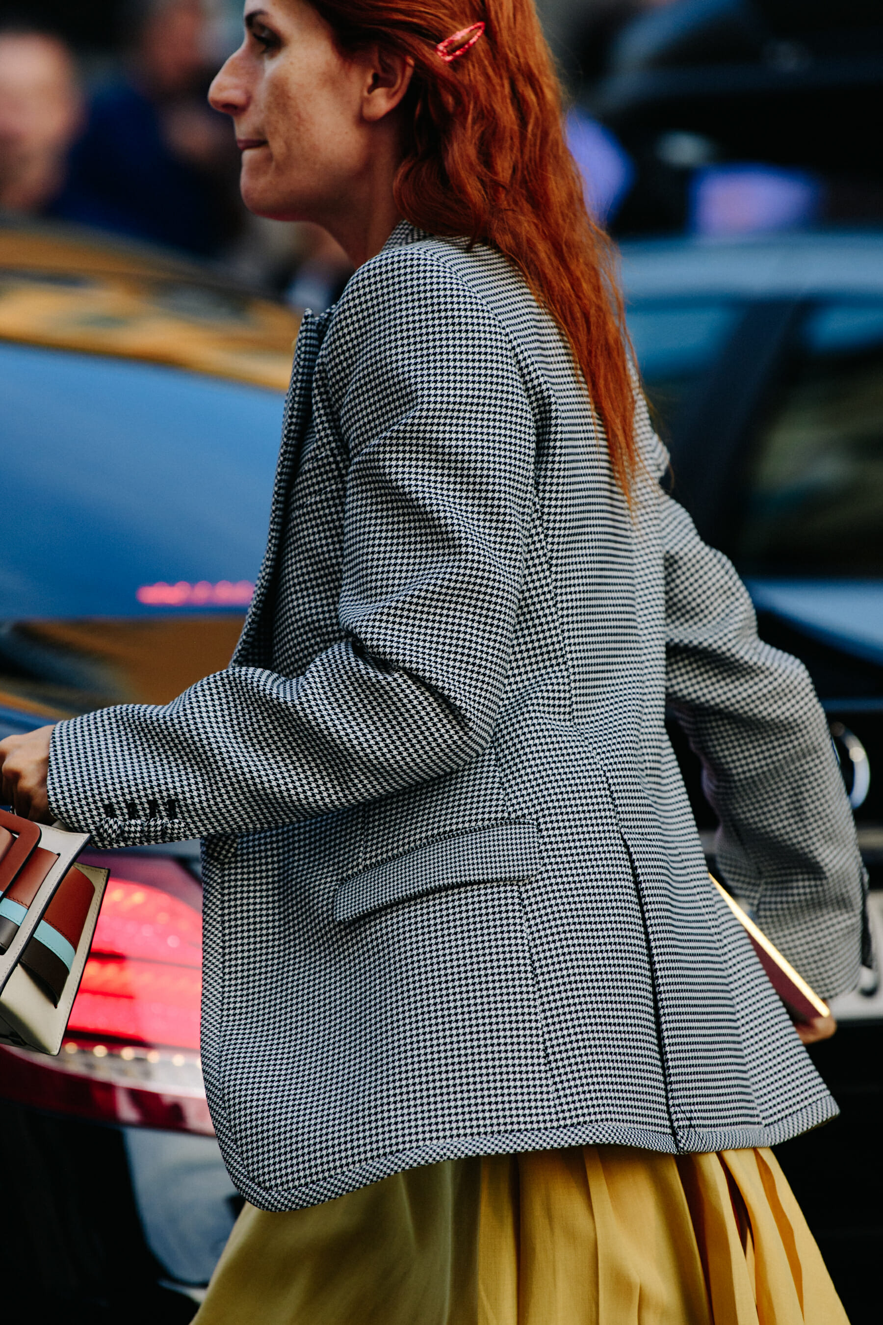 Woman wearing check blazer