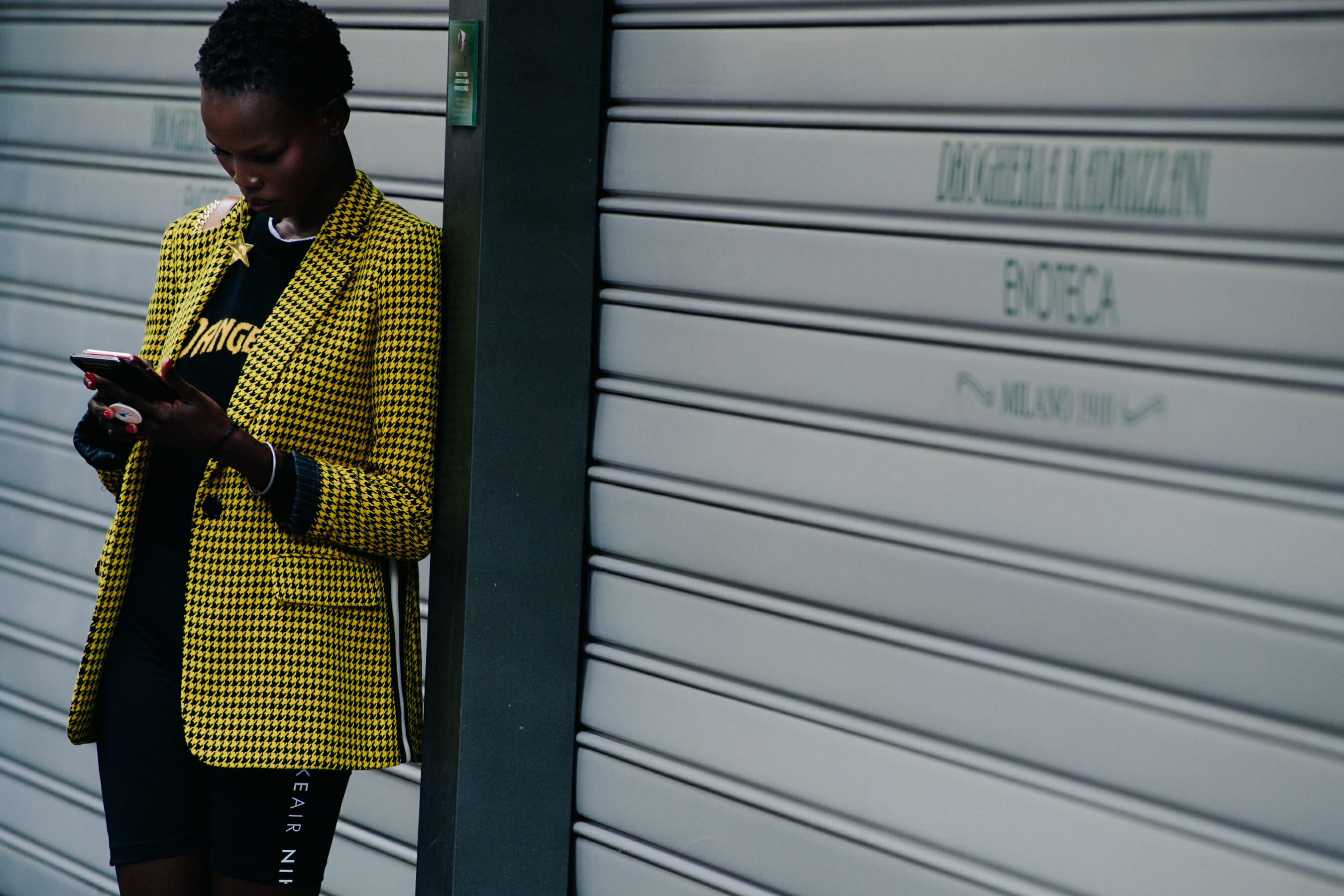 Model wearing yellow blazer