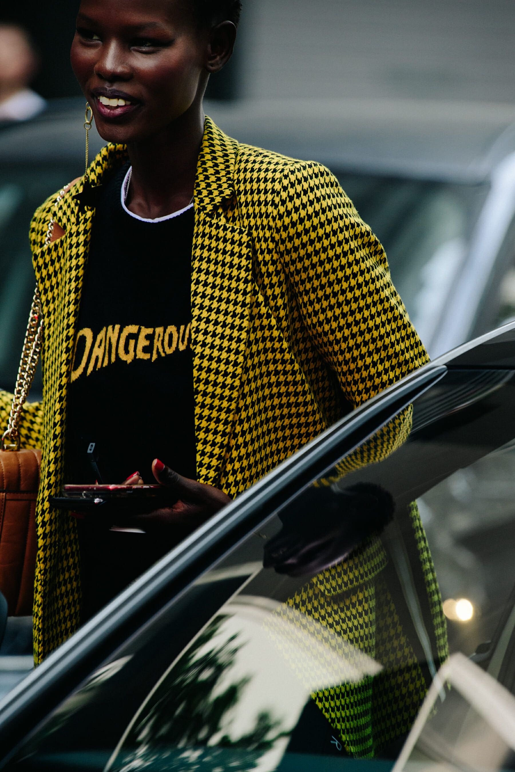 Model wearing yellow blazer