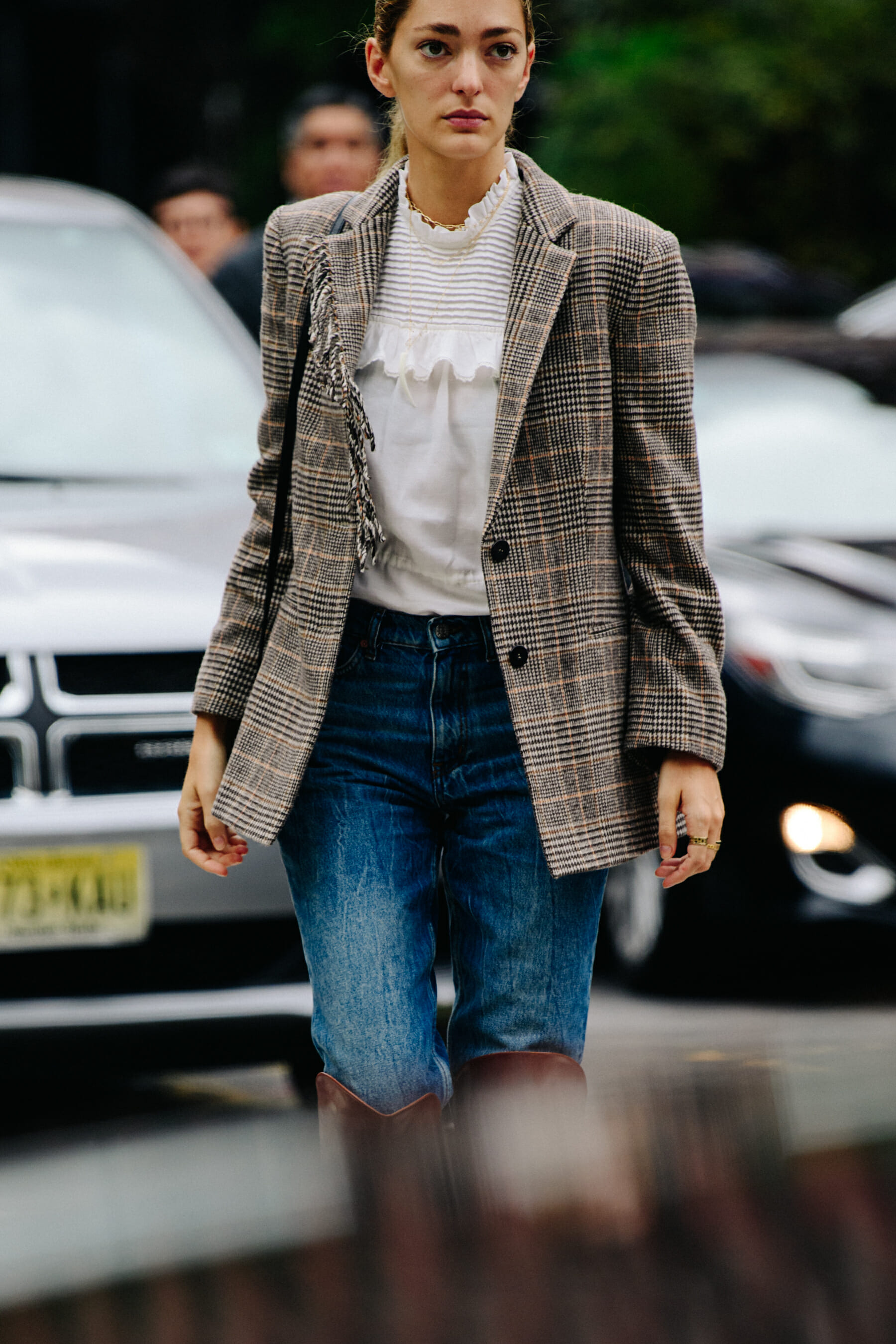 Woman wearing check jacket