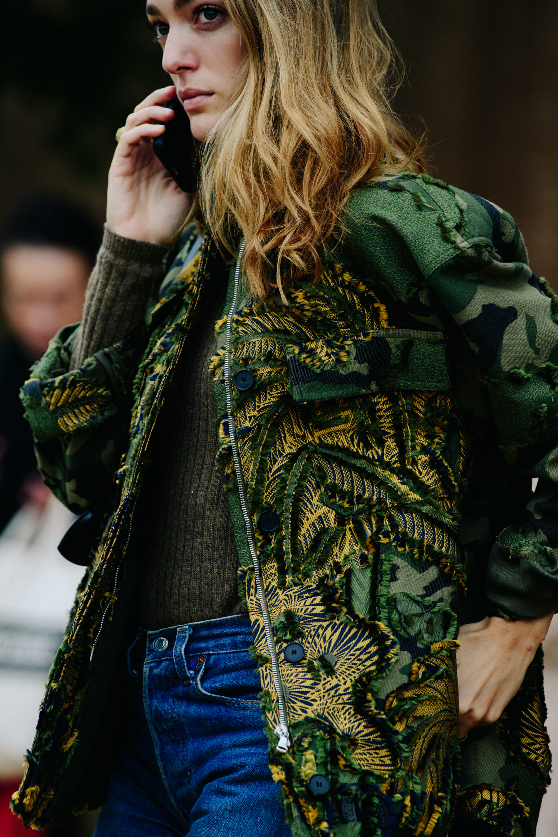 Woman wearing green pattern jacket