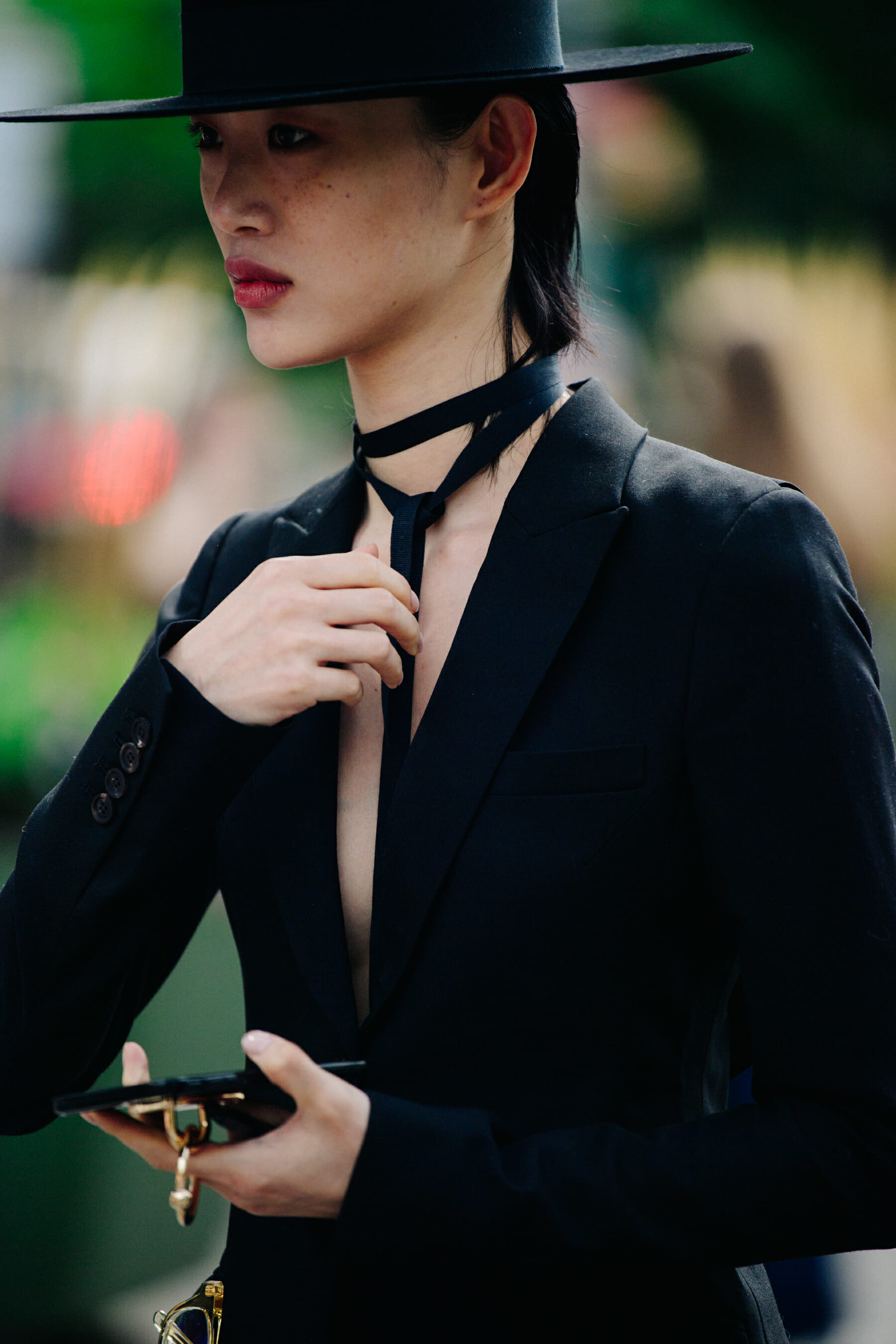 Model wearing black hat