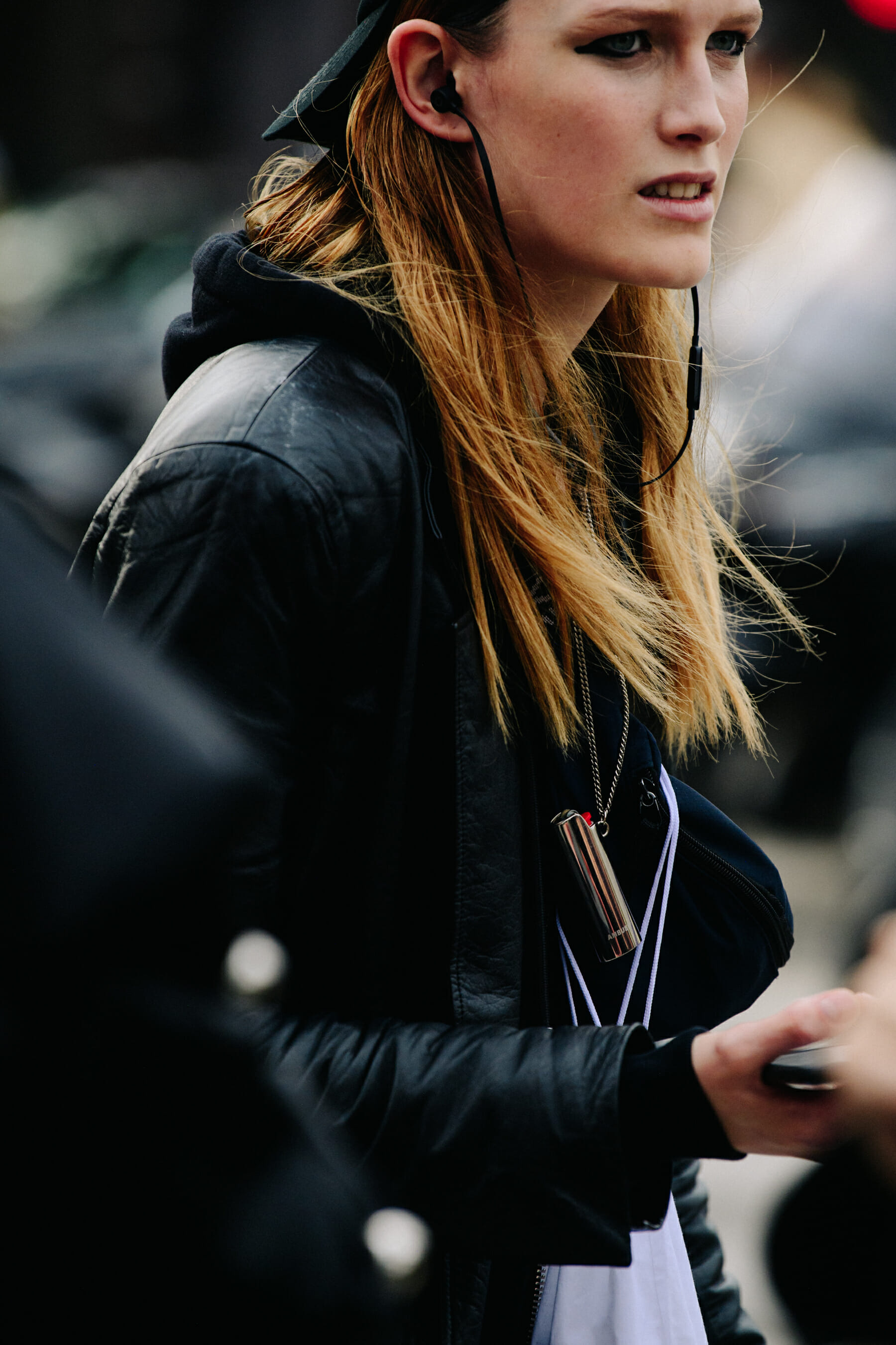 Model wearing black coat