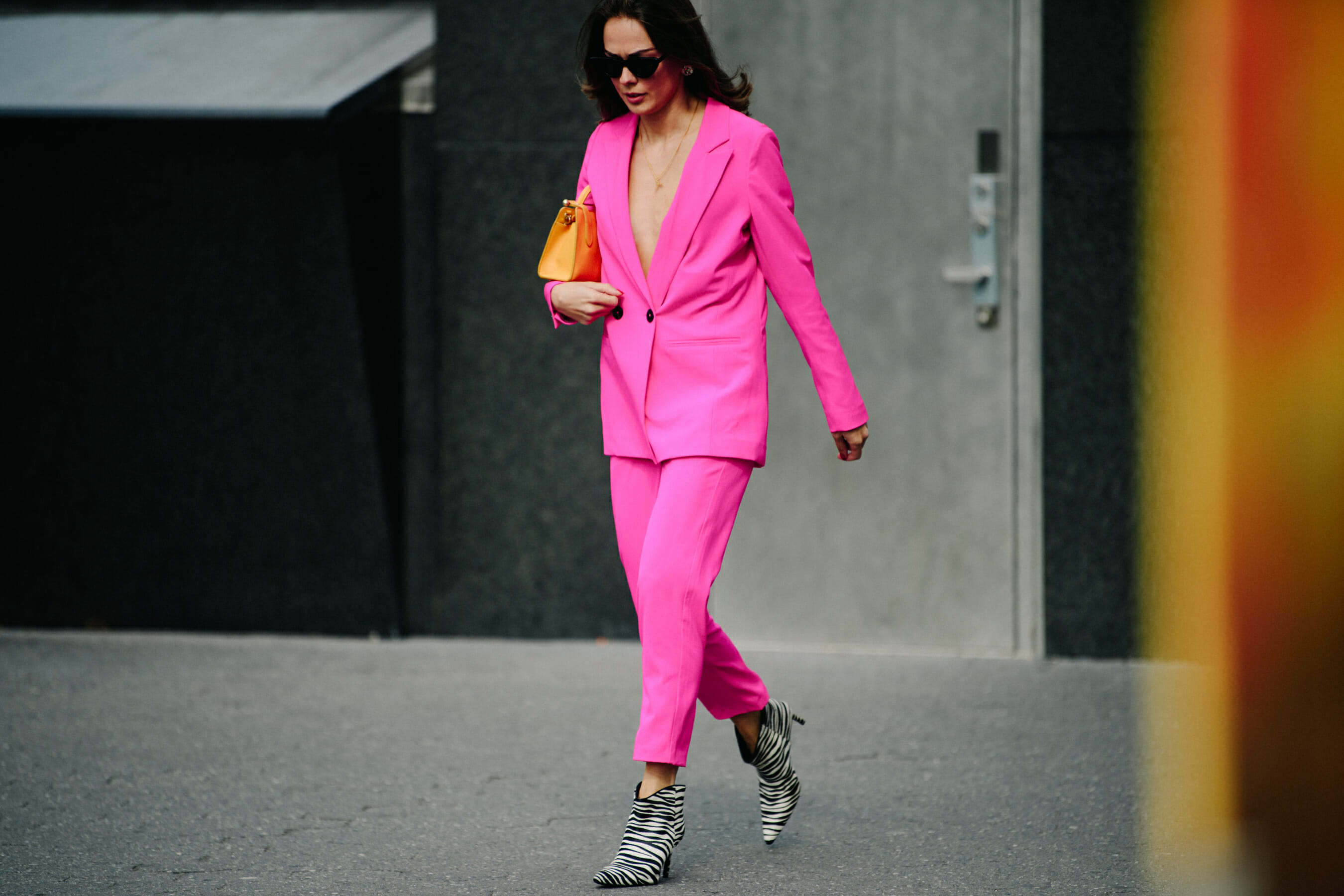 Woman wearing pink suit