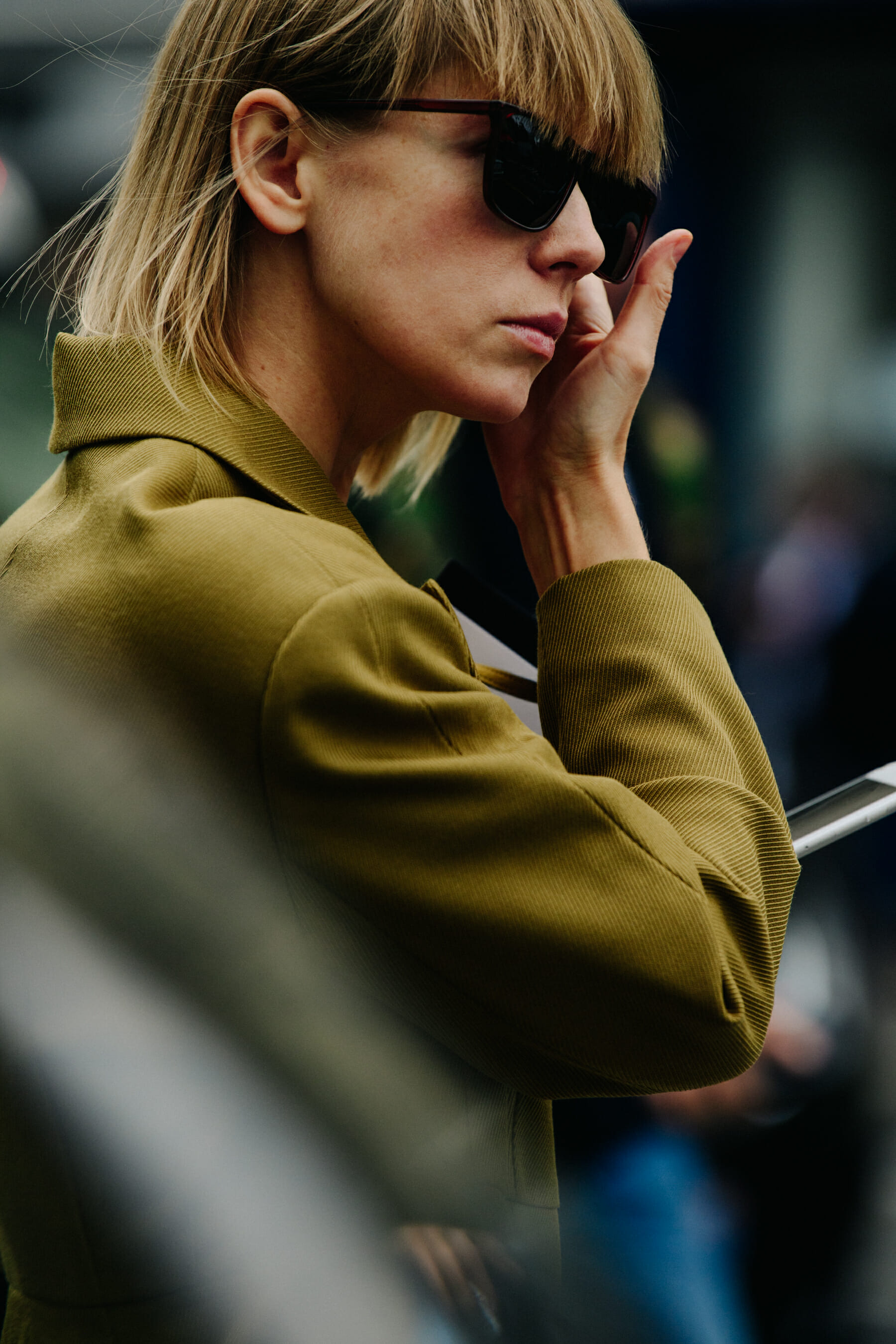 Woman wearing green suit