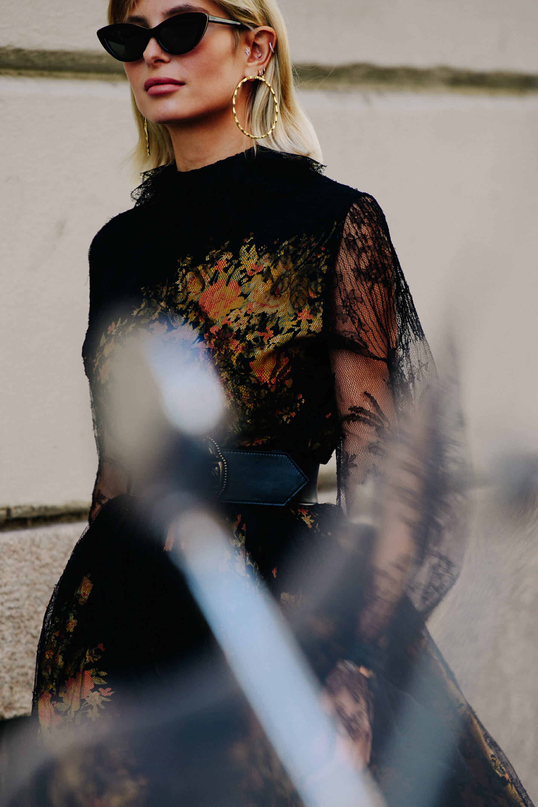 Woman wearing gold earrings