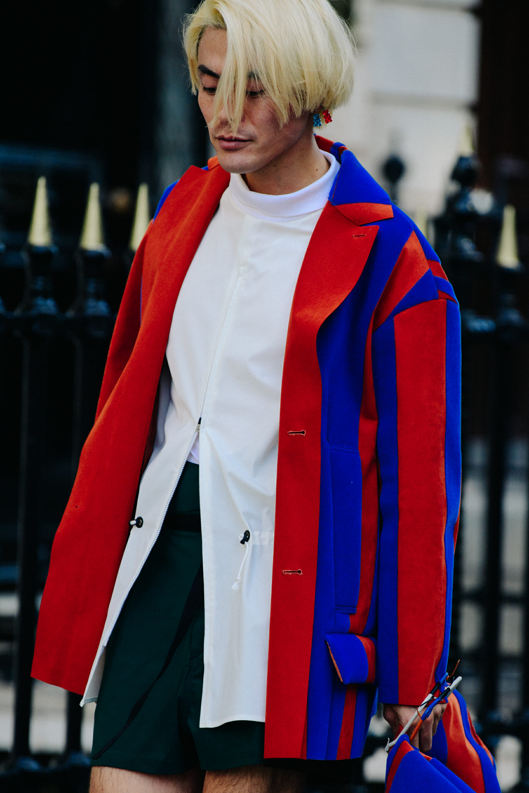 Man wearing striped jacket