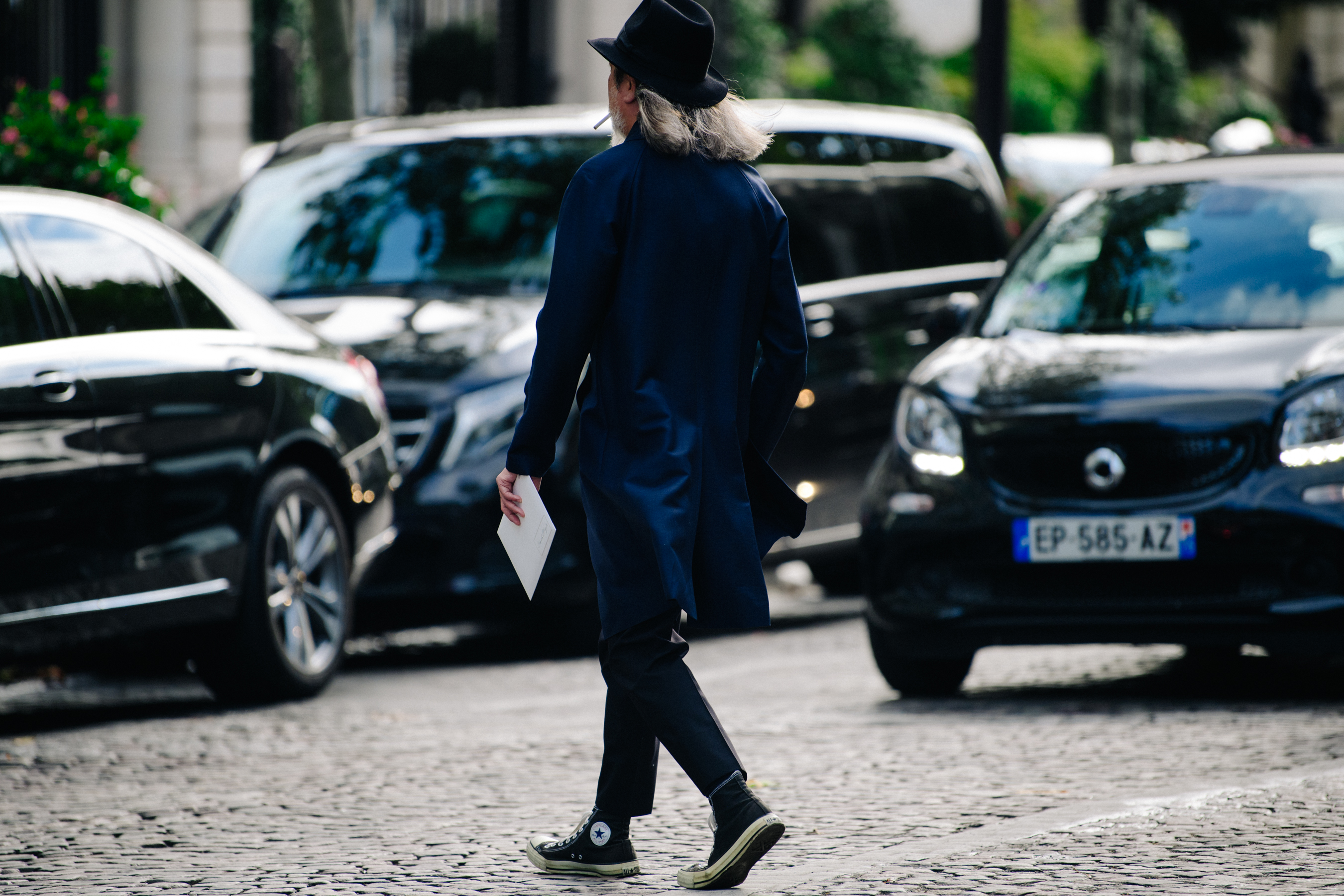 Man wearing blue coat