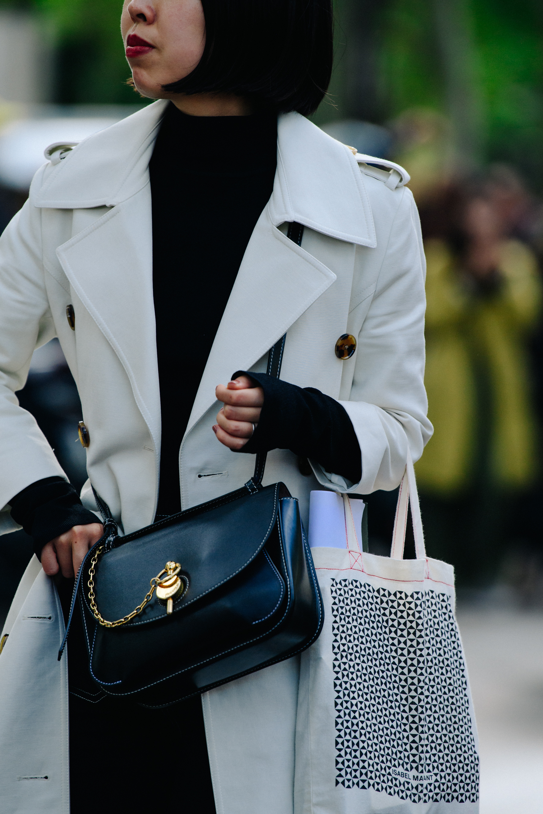 Woman wearing white coat