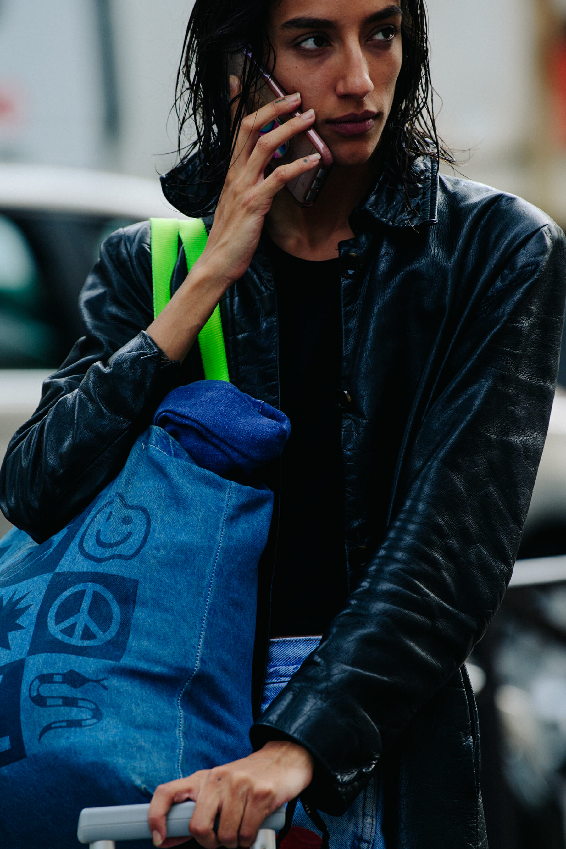 Model wearing black leather
