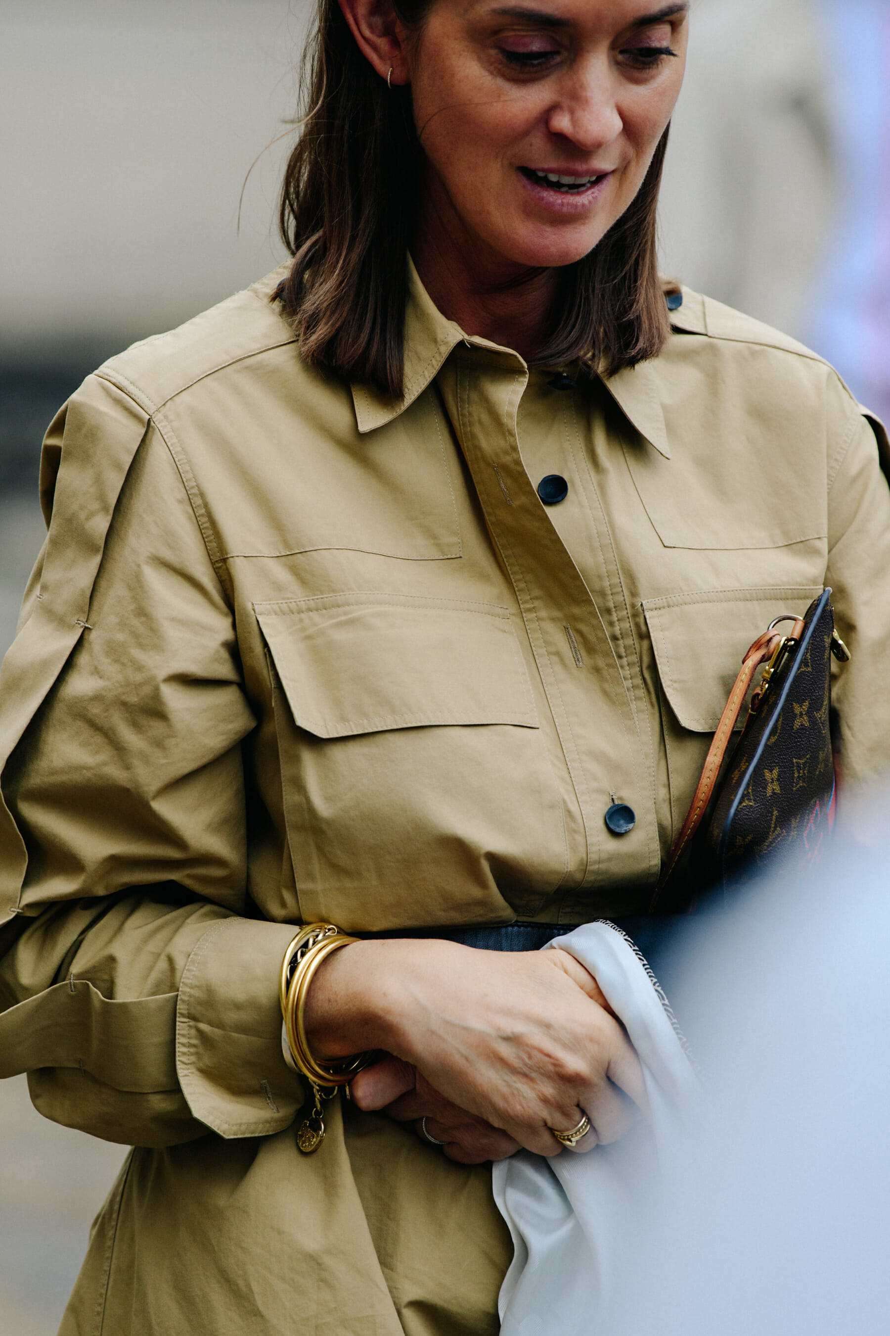 Woman wearing tan coat