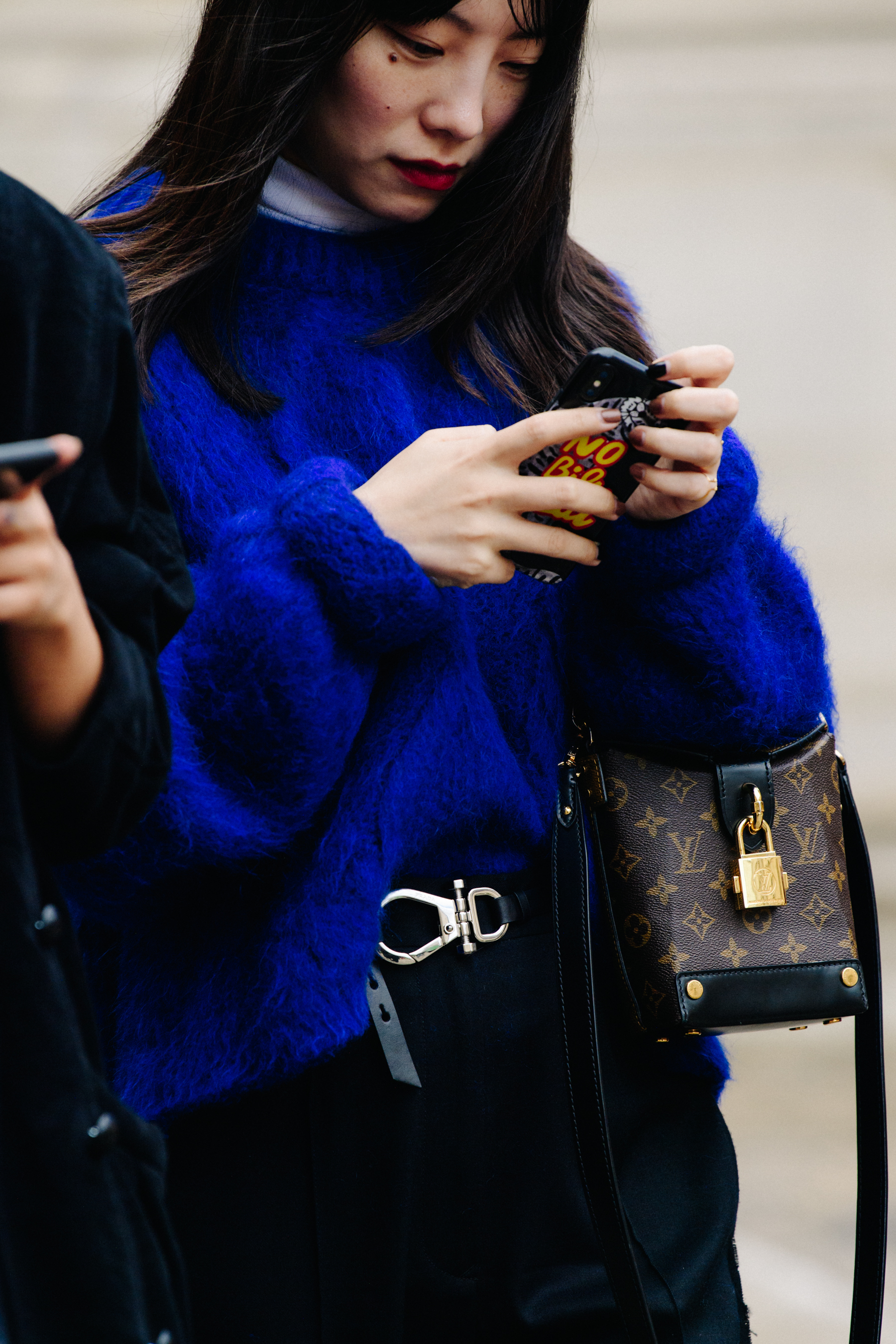 Woman wearing blue jumper