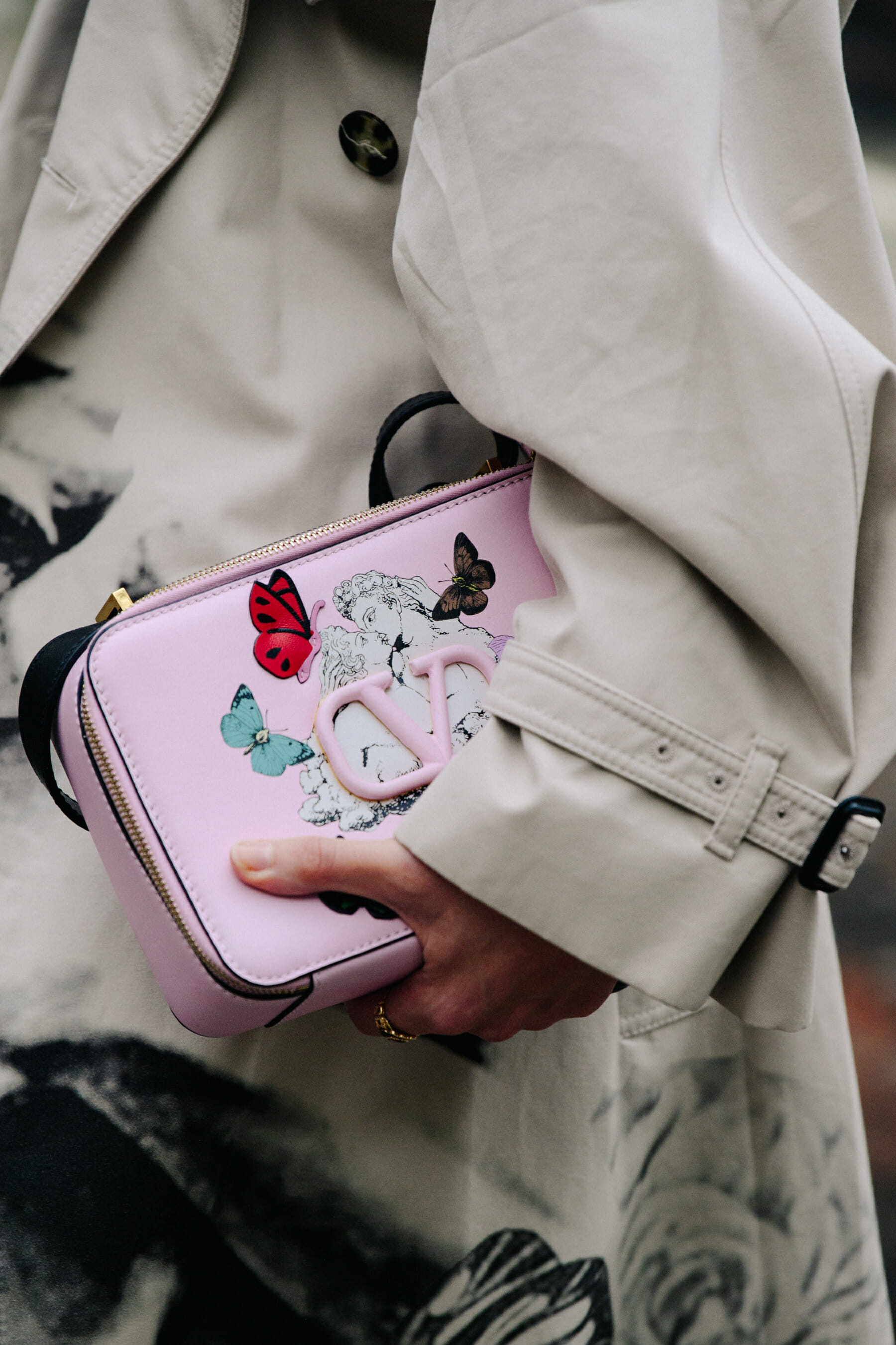 Woman carrying Valentino purse