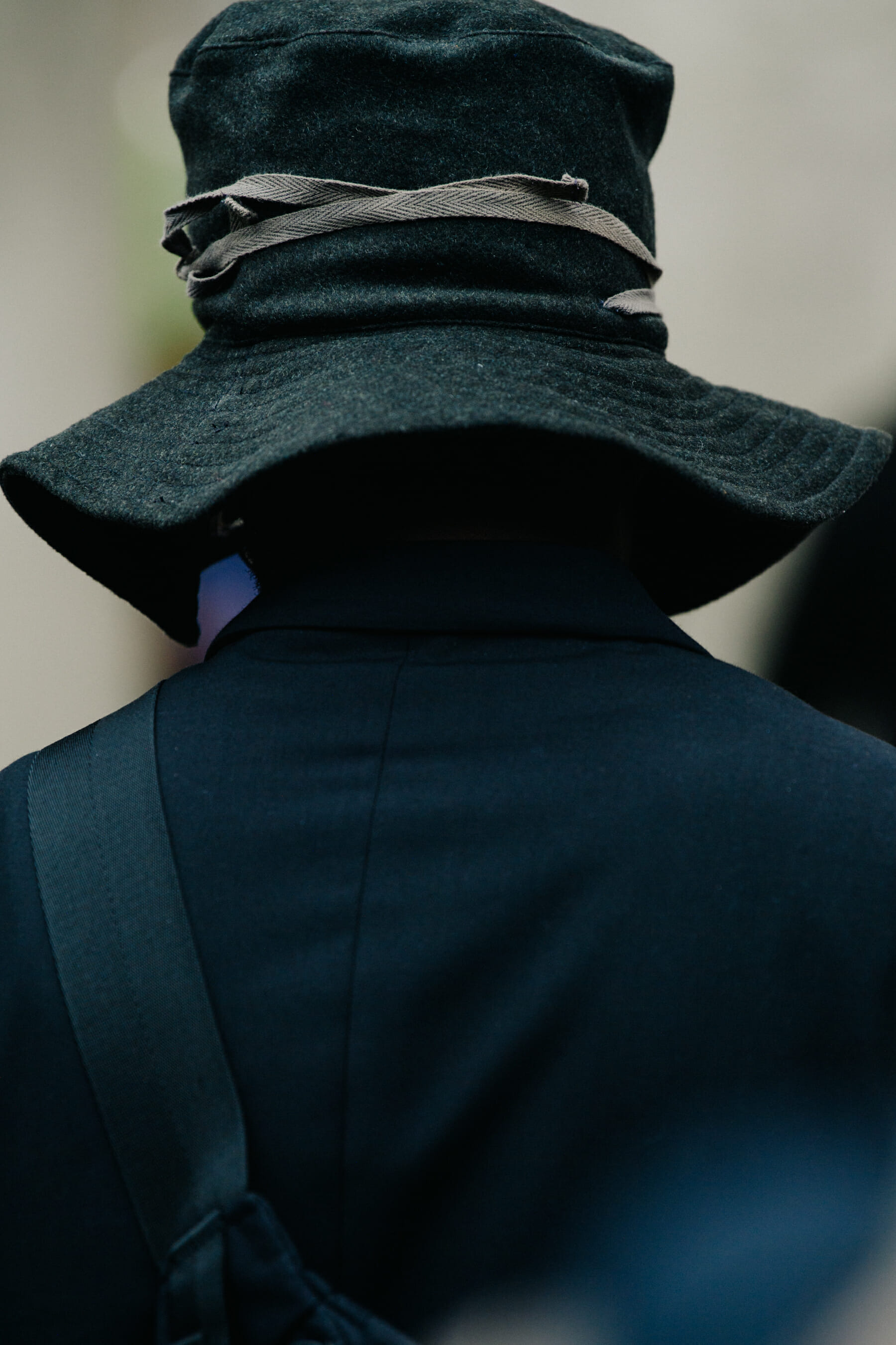 Man wearing grey hat