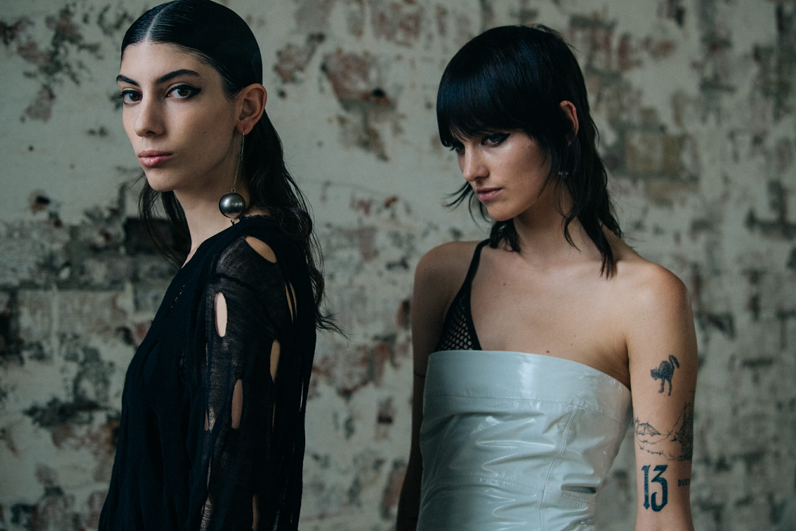Models wearing white at Ann Demeulemeester