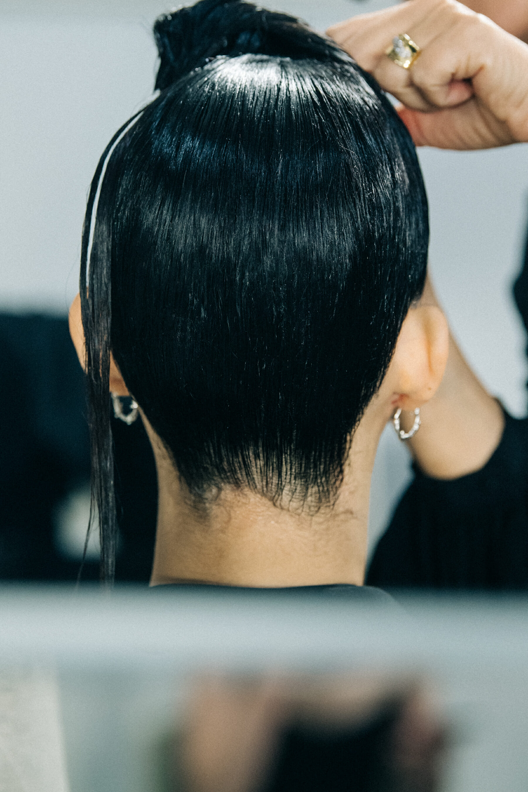 Model in hair and makeup backstage