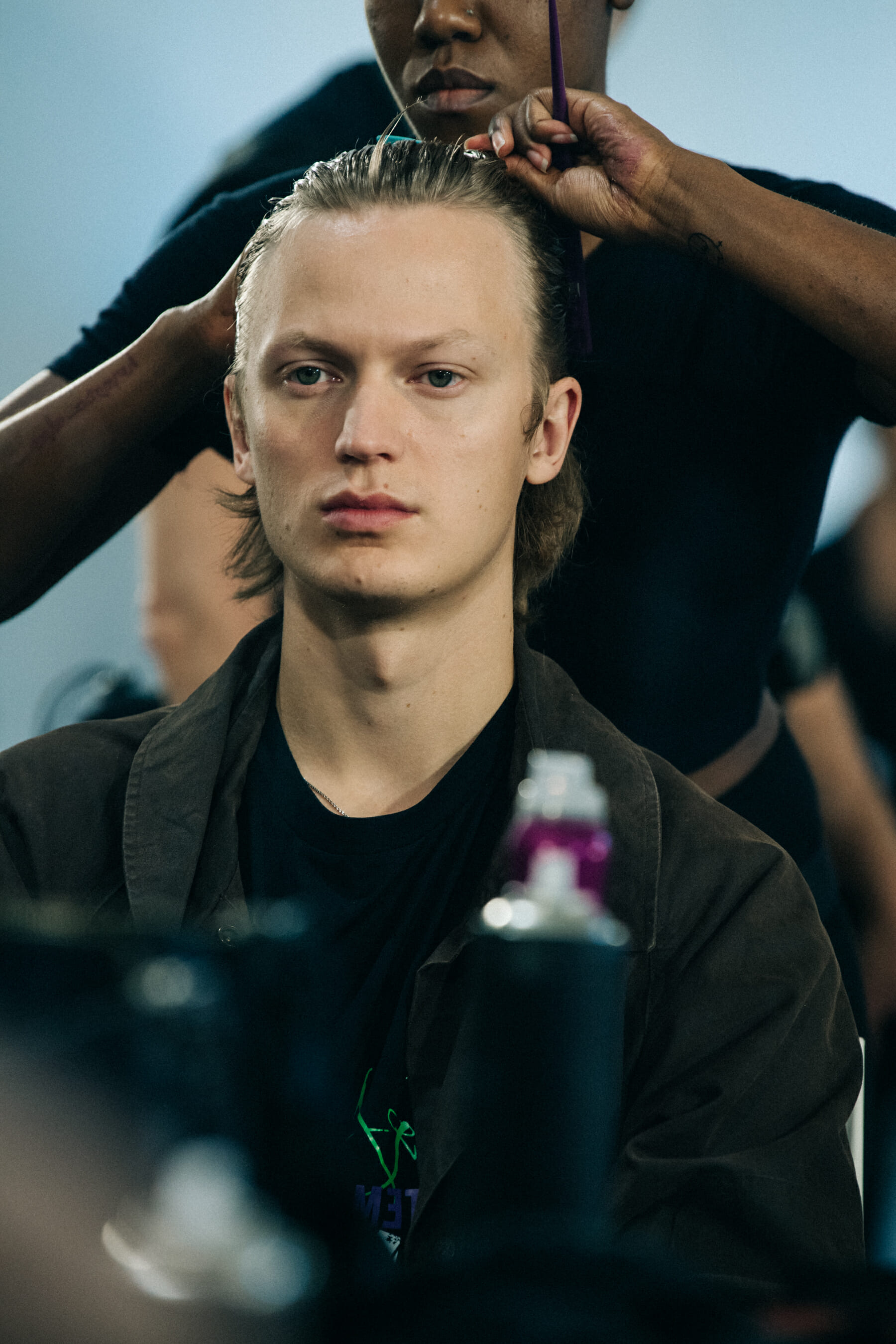 Model in hair and makeup backstage