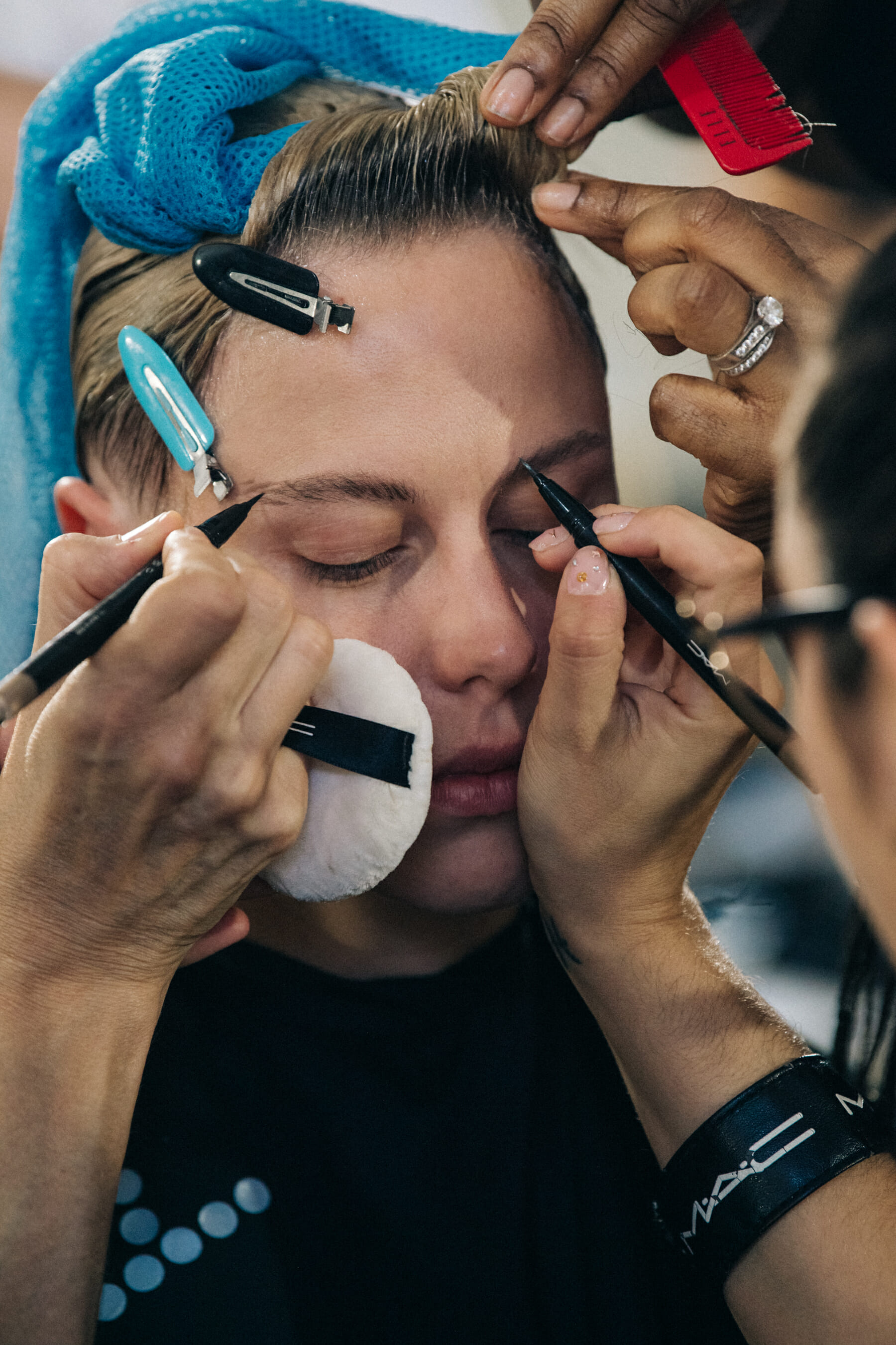 Model in hair and makeup backstage