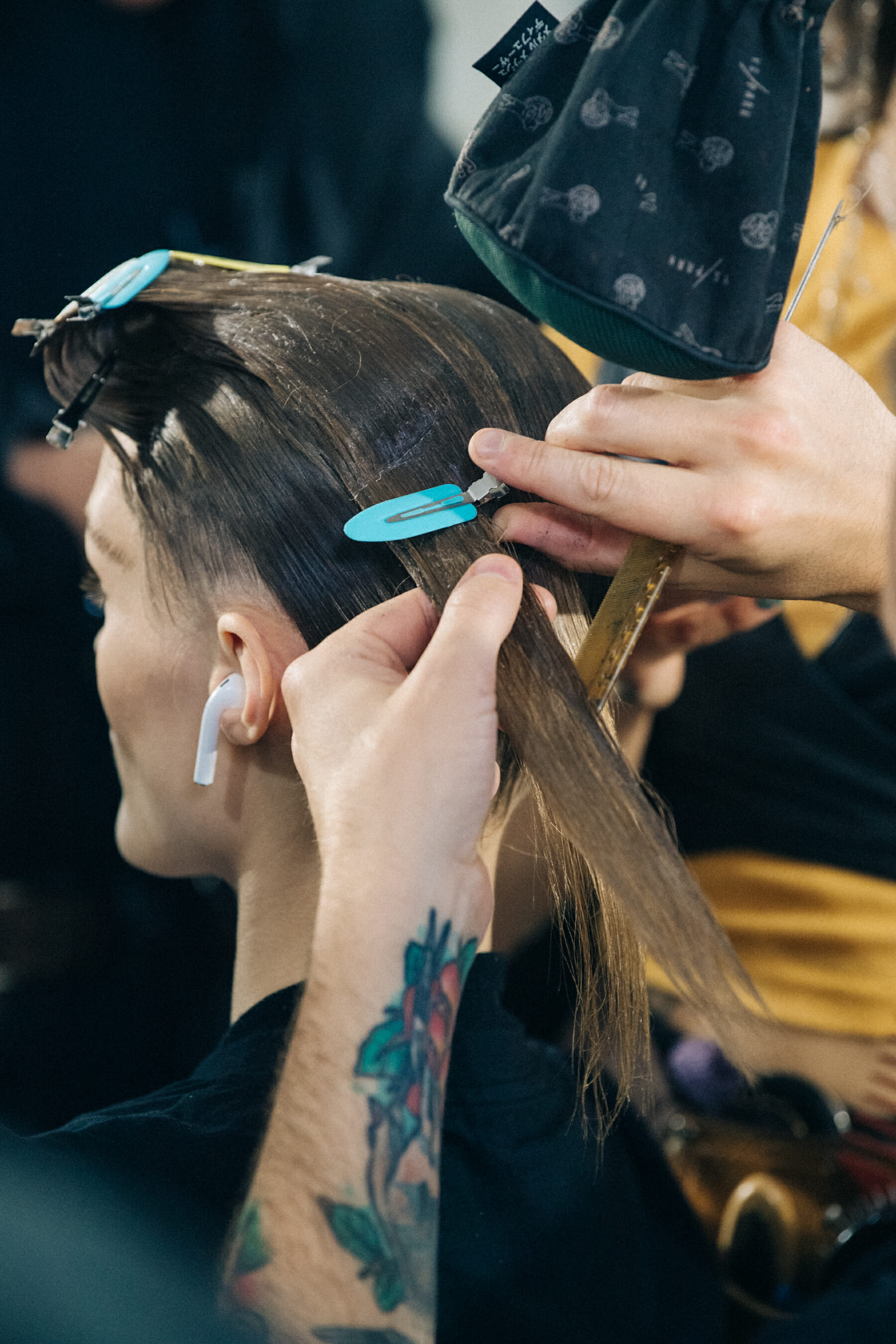 Model in hair and makeup backstage