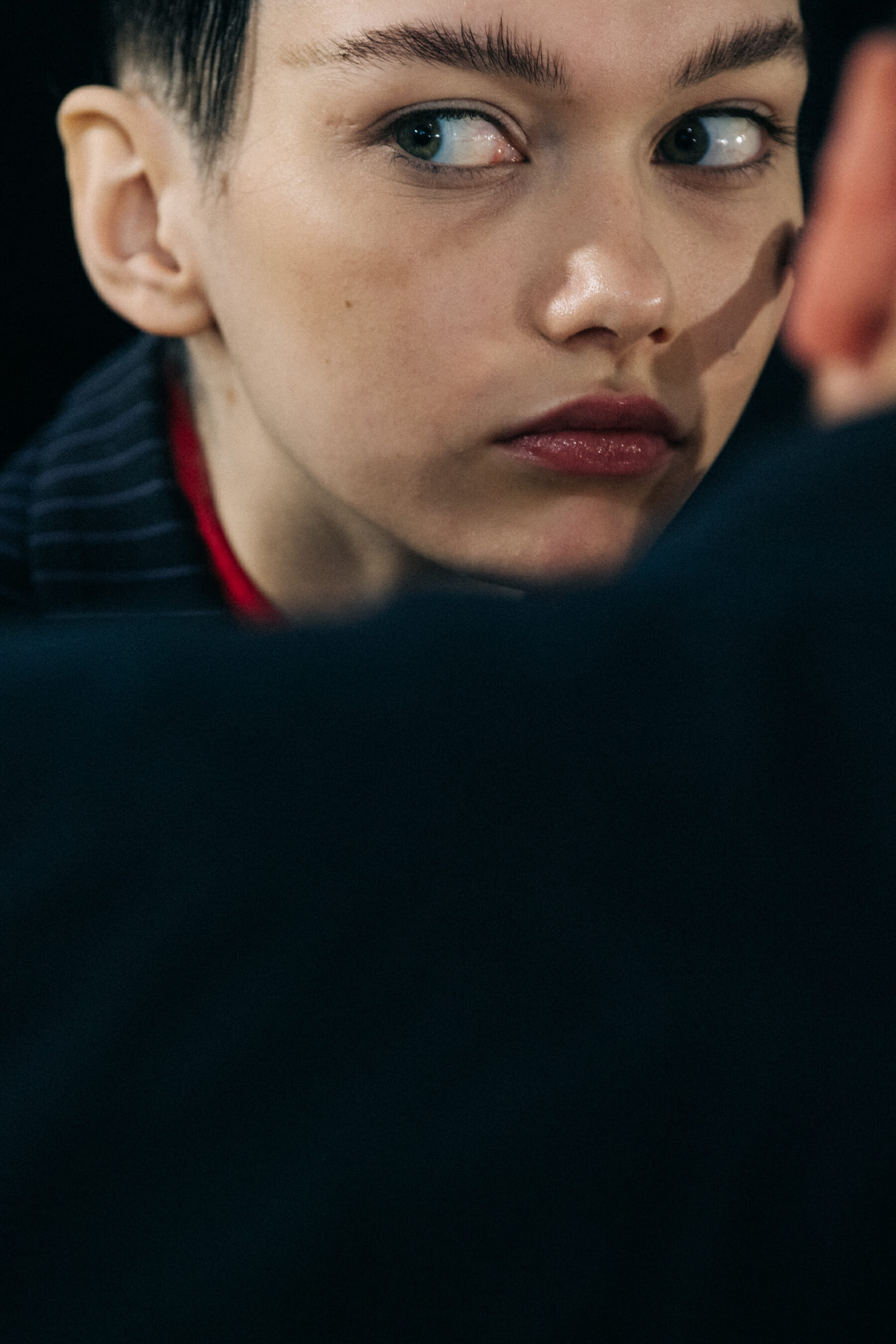 Model in hair and makeup backstage
