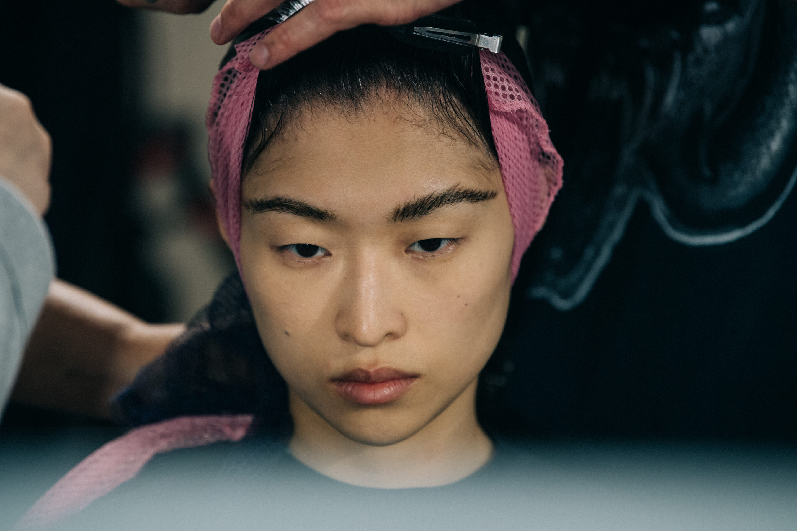 Model in hair and makeup backstage