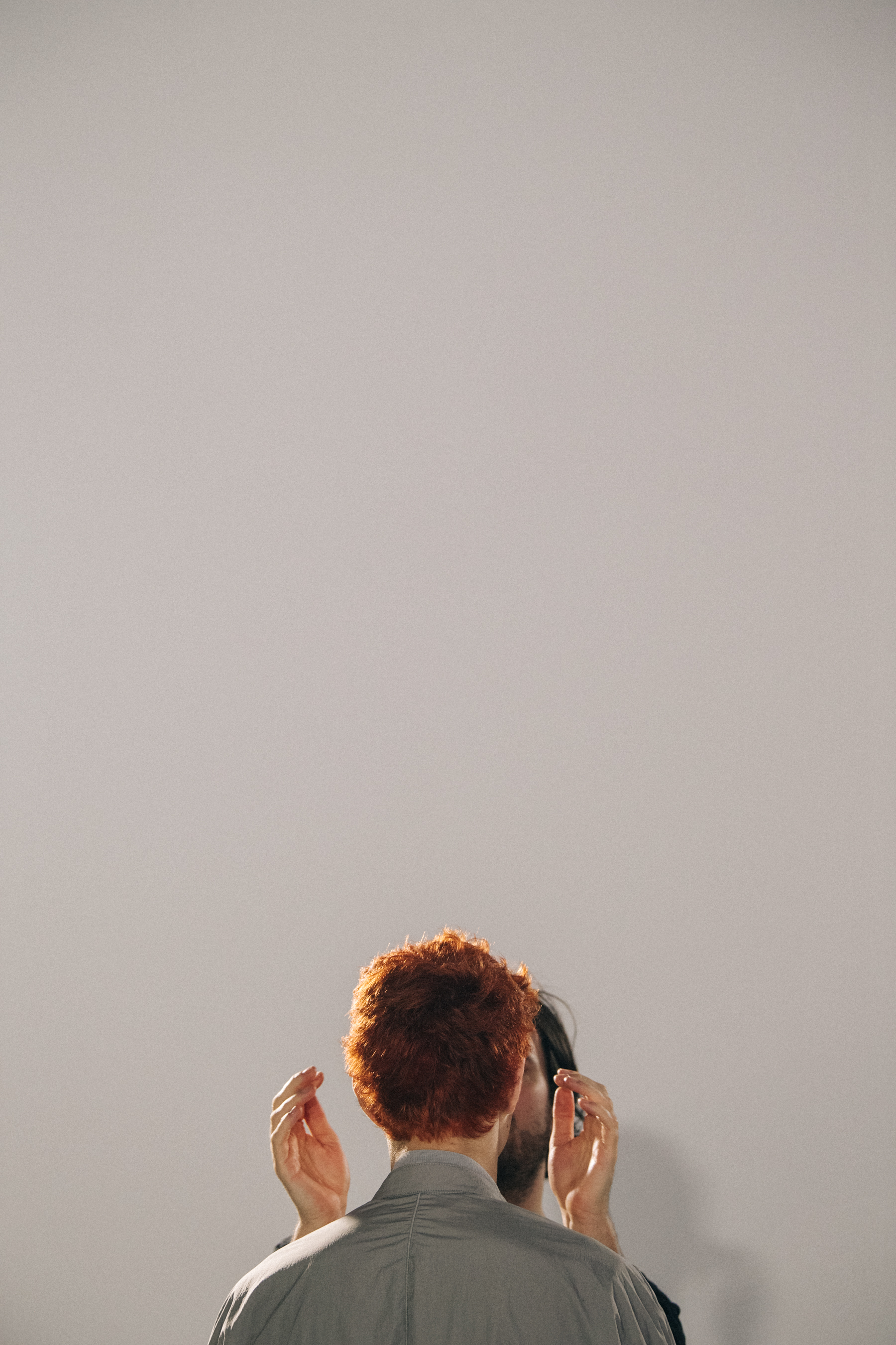 Model with red hair backstage