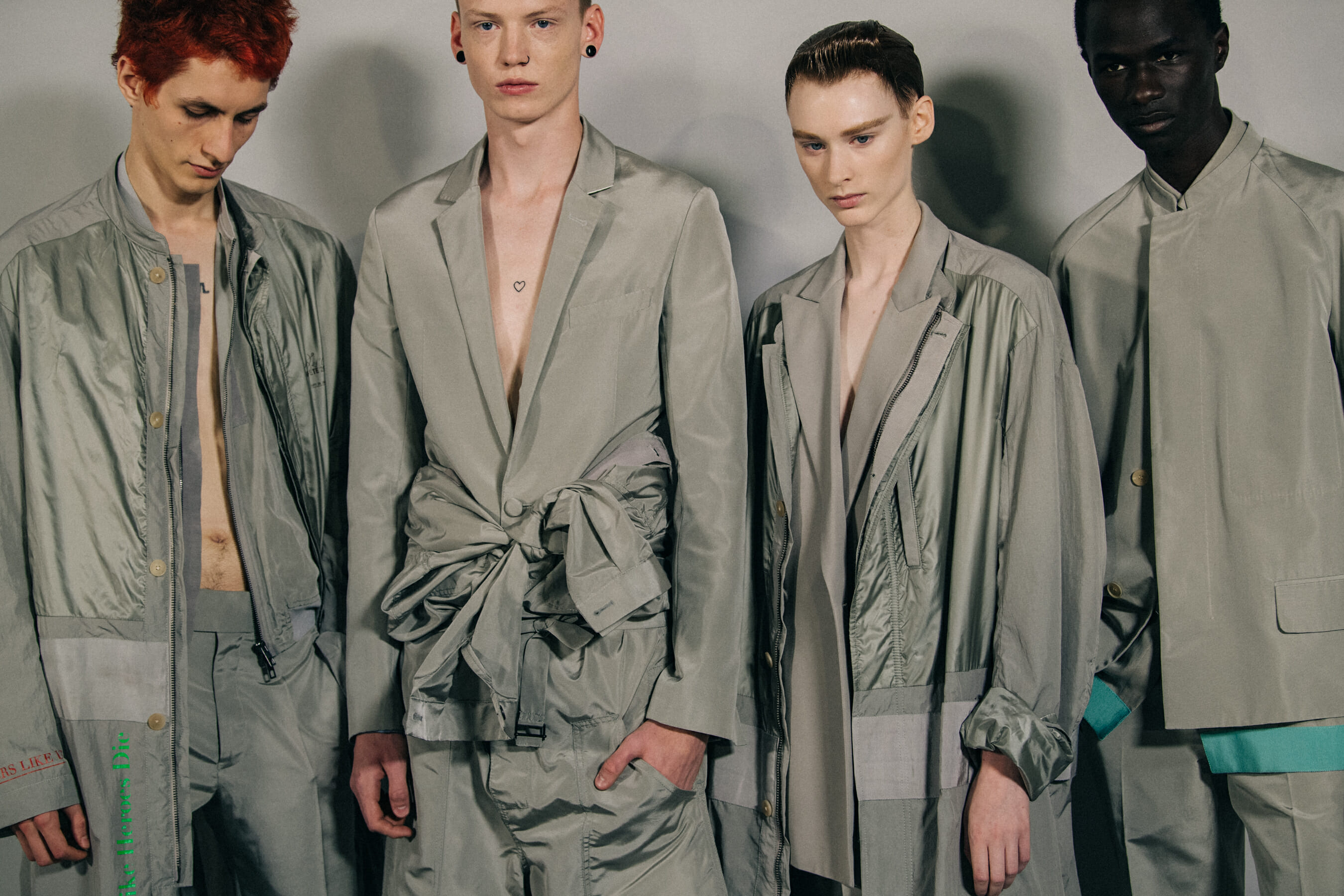 Models wearing grey outfits at Haider Ackermann