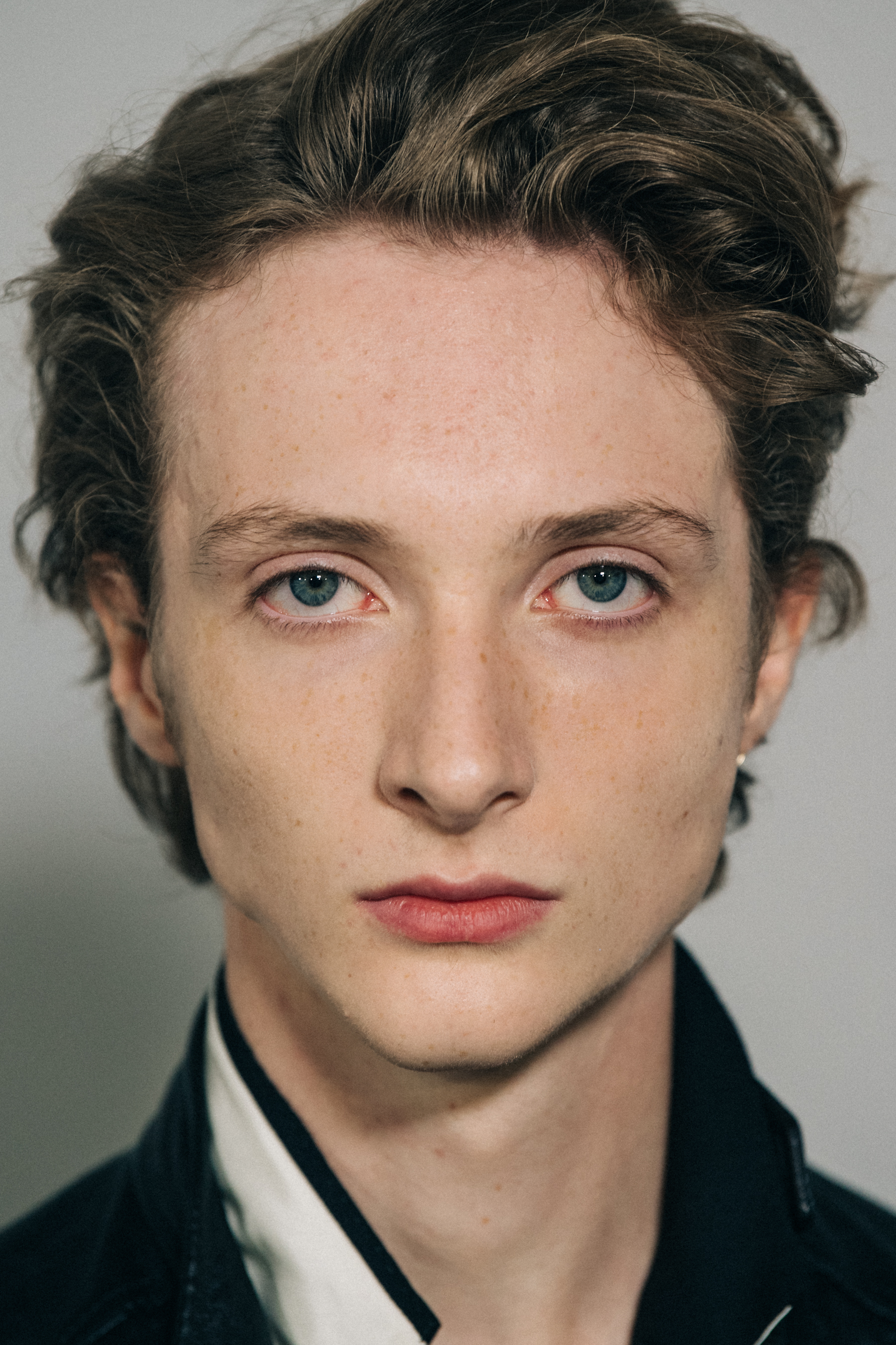 Model with dark scruffy hair
