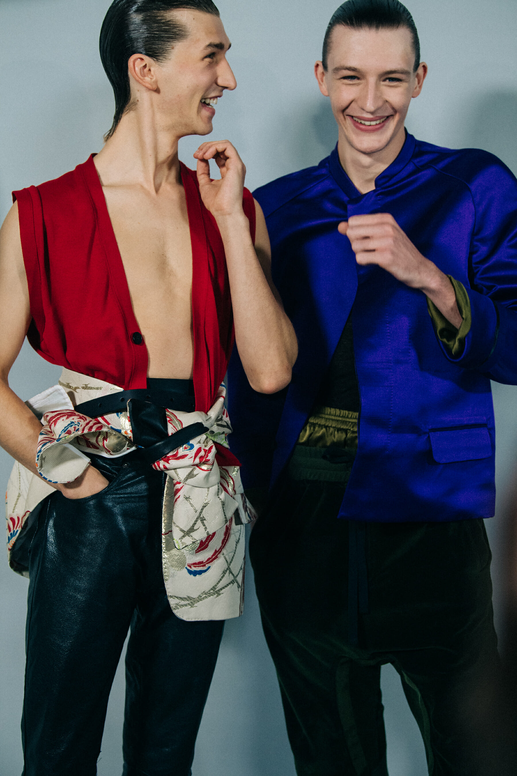 Model wearing blue shirt backstage