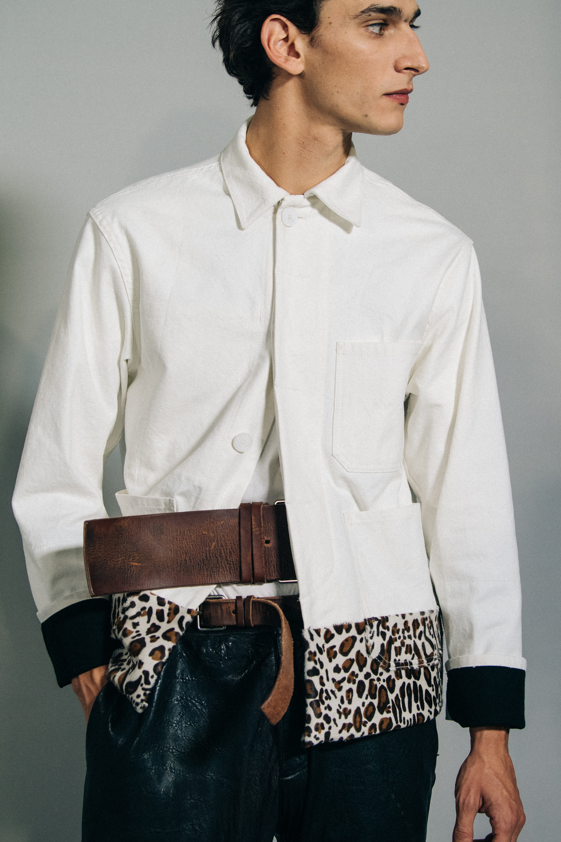 Model wearing white shirt at Haider Ackermann